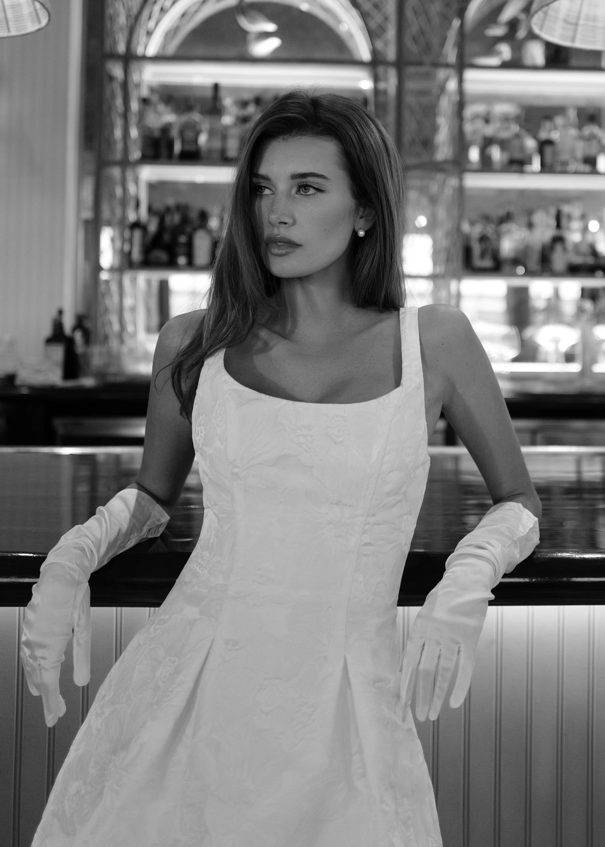 The Petal Pop Little White Dress is a scoop neck mini dress of Hibiscus Jacquard with figure flattering princess seams opening to soft pleats in Silk White.