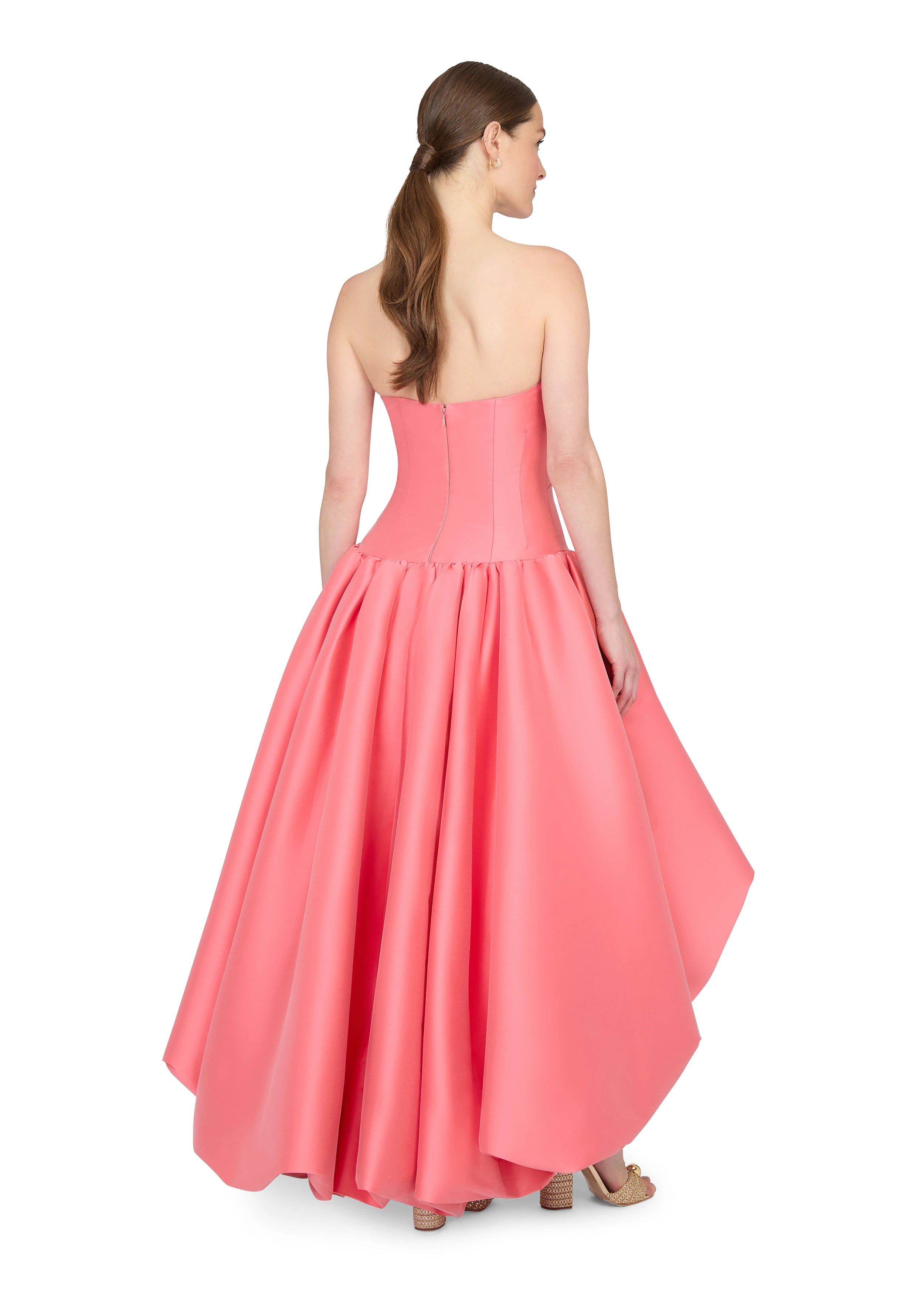 Anne Barge evening gown Consuelo, an arched strapless drop waist bodice with asymmetrical draping and high-low bubble hem gathered skirt.