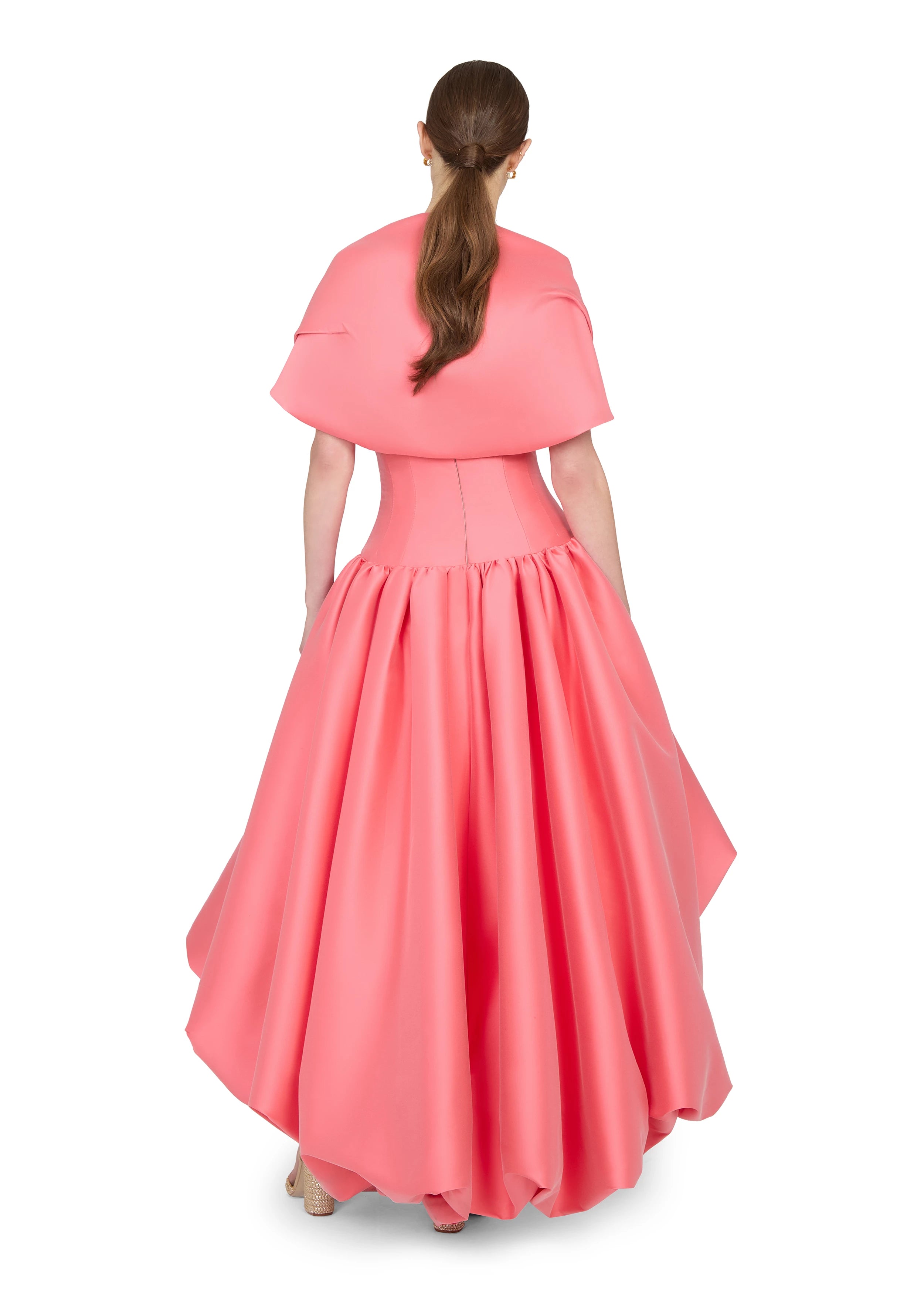 Anne Barge evening gown Consuelo, an arched strapless drop waist bodice with asymmetrical draping and high-low bubble hem gathered skirt.