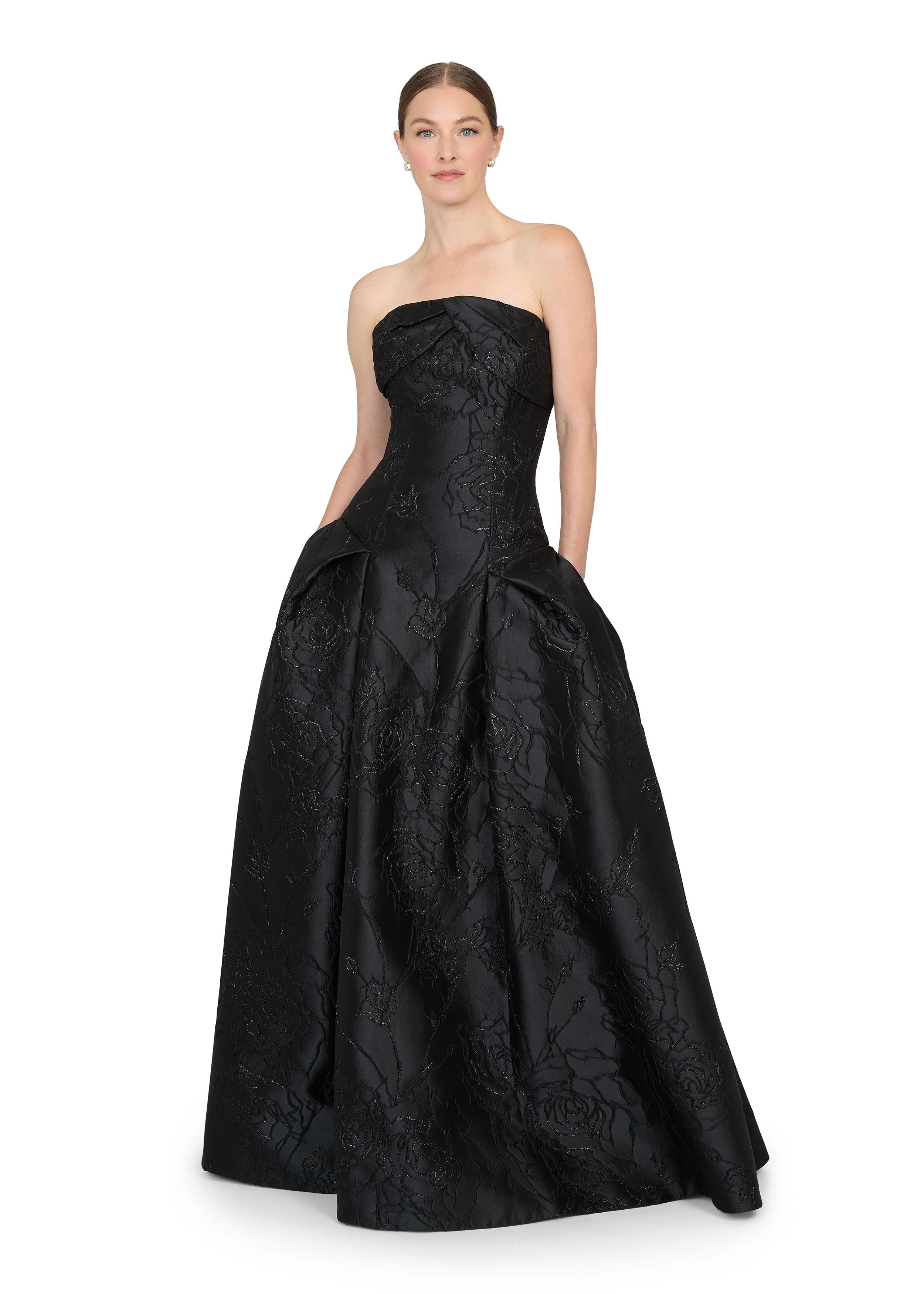 Anne Barge evening gown Letizia, is an arched strapless drop waist ballgown of Camellia Vine Jacquard with neckline draping and pleated skirt.