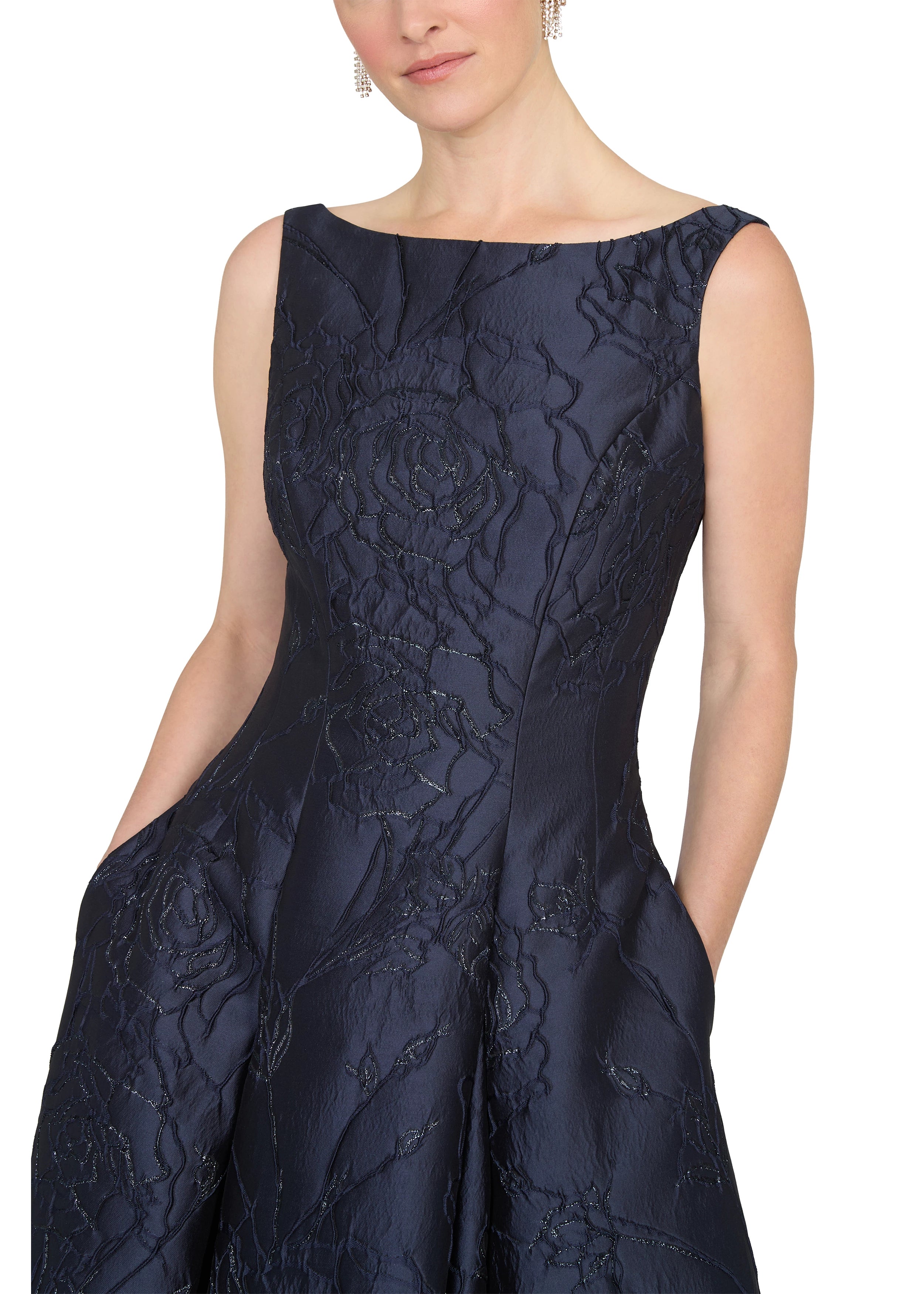 Anne Barge evening gown Marcel, a seam gown of Camellia Vine Jacquard with inverted box pleats and pockets.