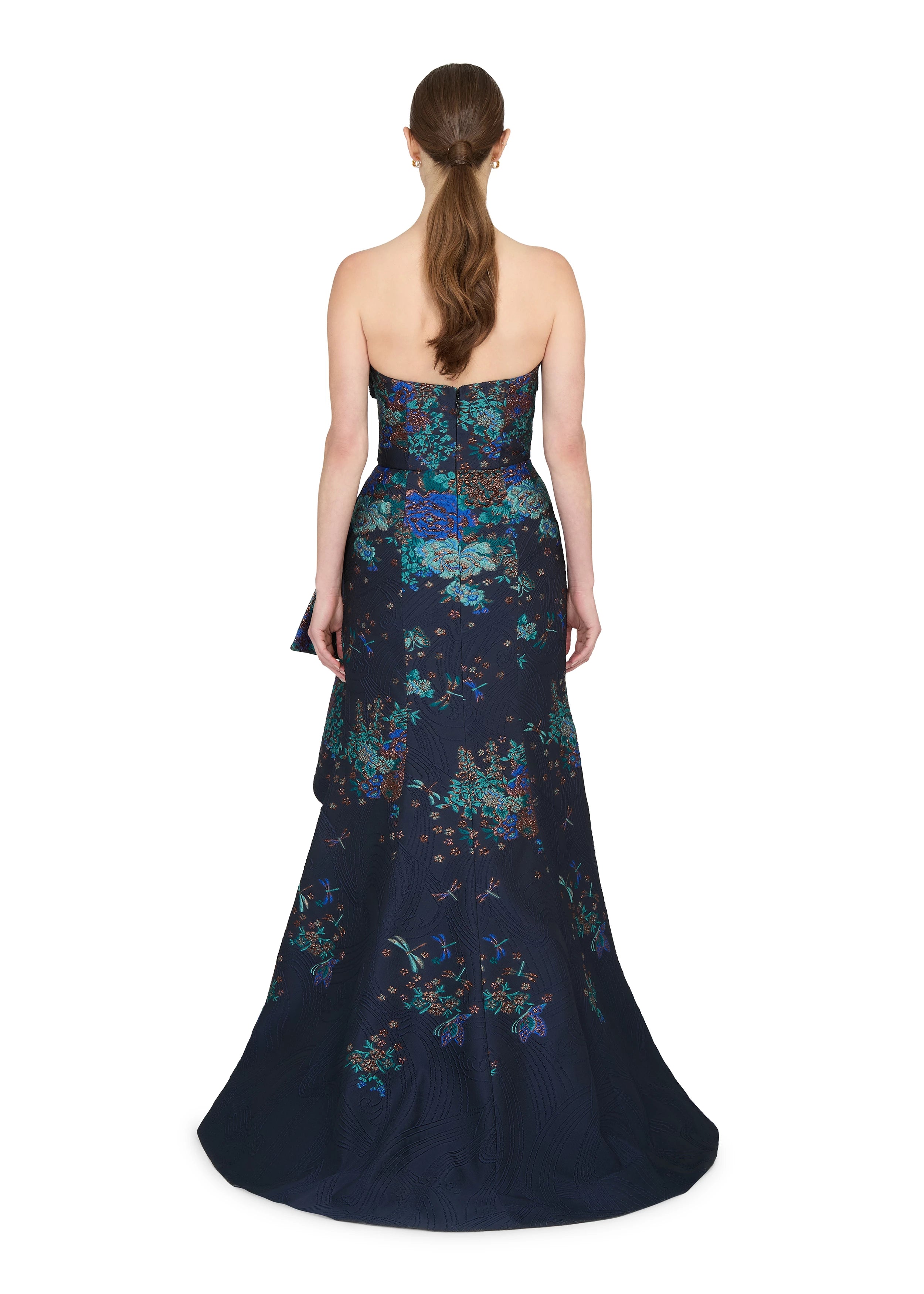 Anne Barge evening gown Mariana, an asymmetrically draped strapless flare gown of Butterfly Blossom Organza Jaquard with side sash.