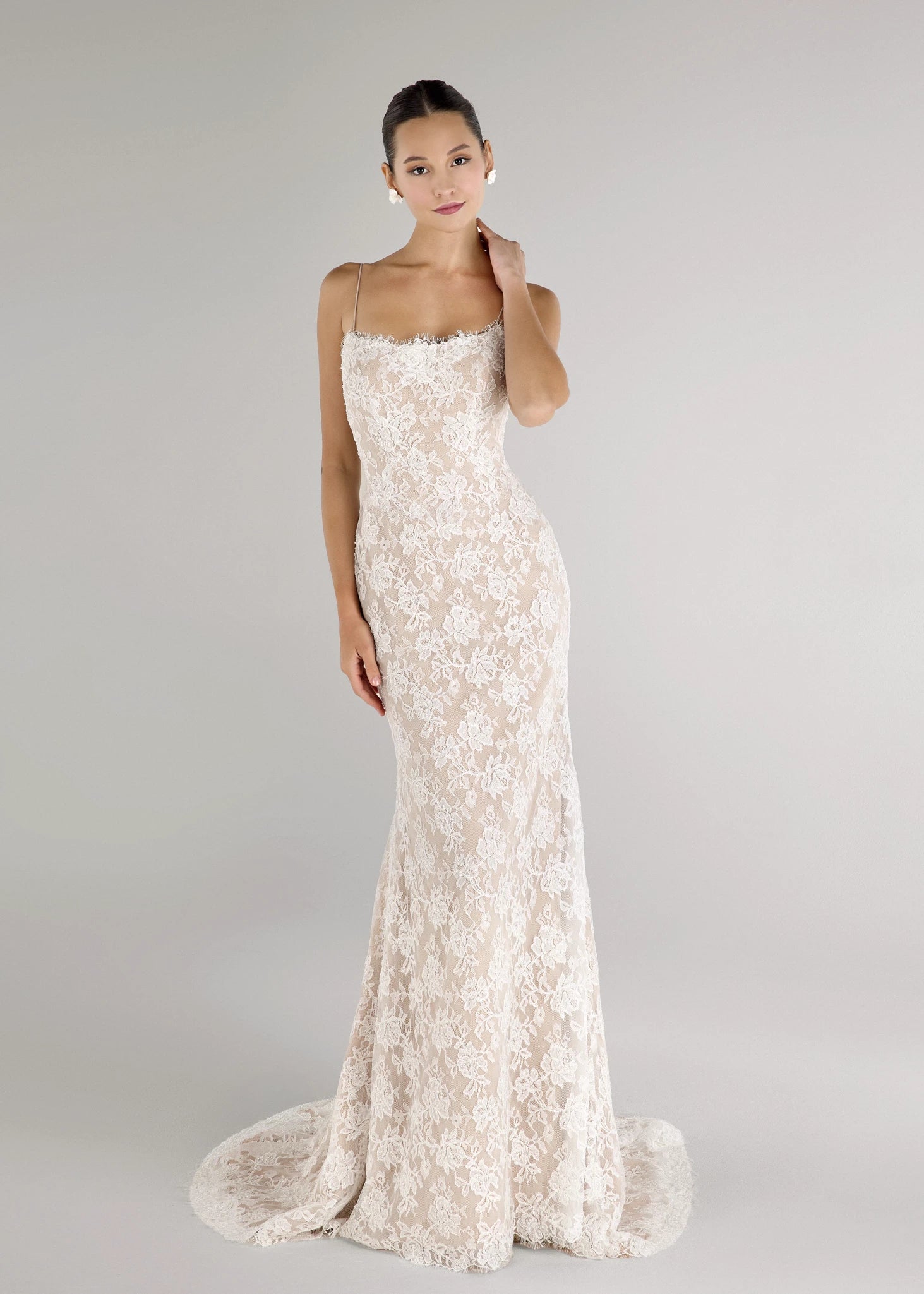 The Gibbes gown is a soft scoop neckline fit-to-flare gown of Beaded Floral Corded Lace with a curved waist seam