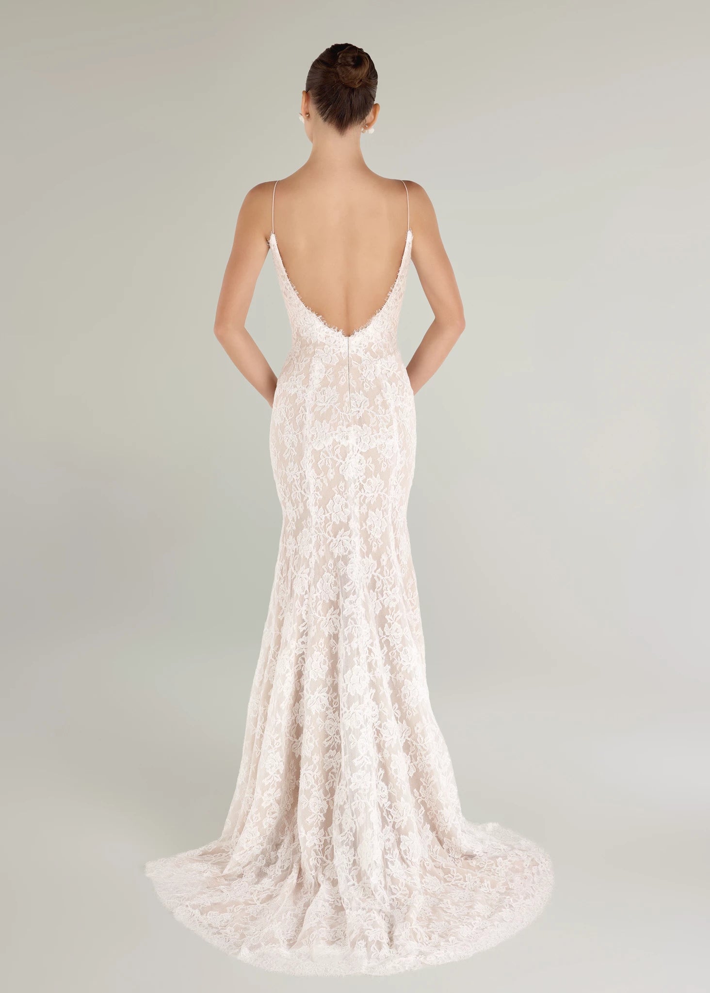 The Gibbes gown is a soft scoop neckline fit-to-flare gown of Beaded Floral Corded Lace with a curved waist seam