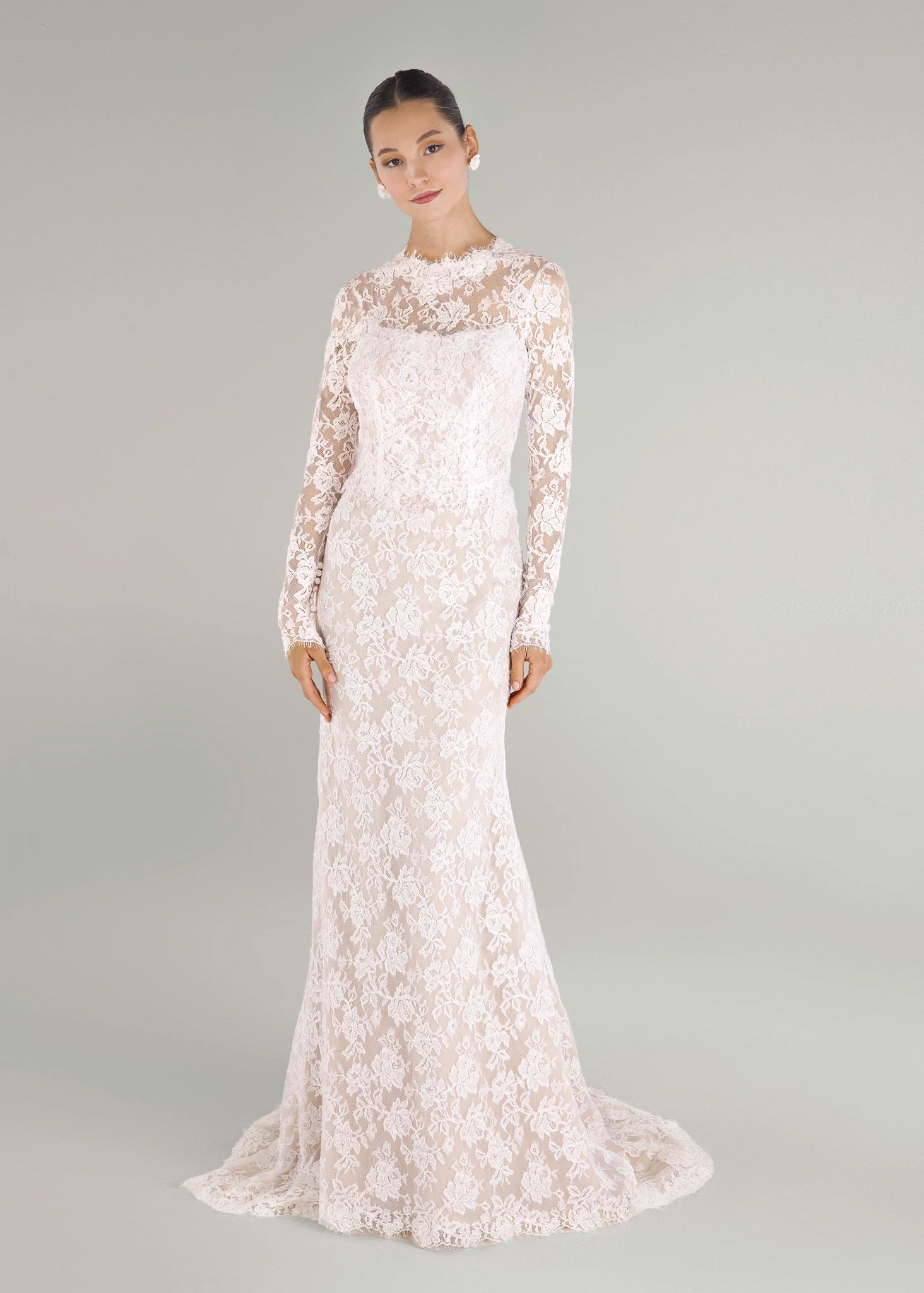 The Blue Willow Gibbes Topper is a long sleeve crewneck top of Beaded Floral Corded Lace in Silk White.