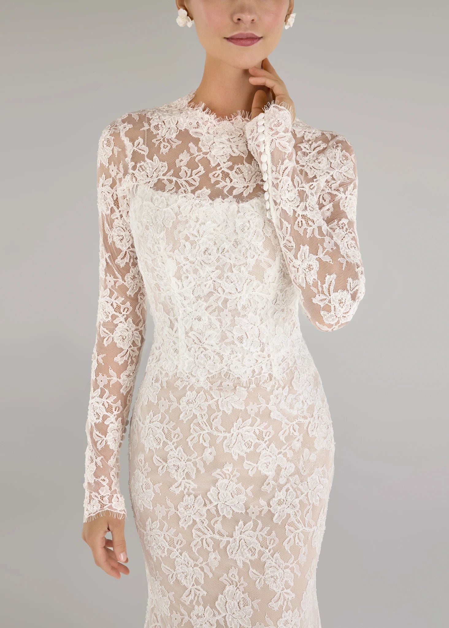 The Blue Willow Gibbes Topper is a long sleeve crewneck top of Beaded Floral Corded Lace in Silk White.