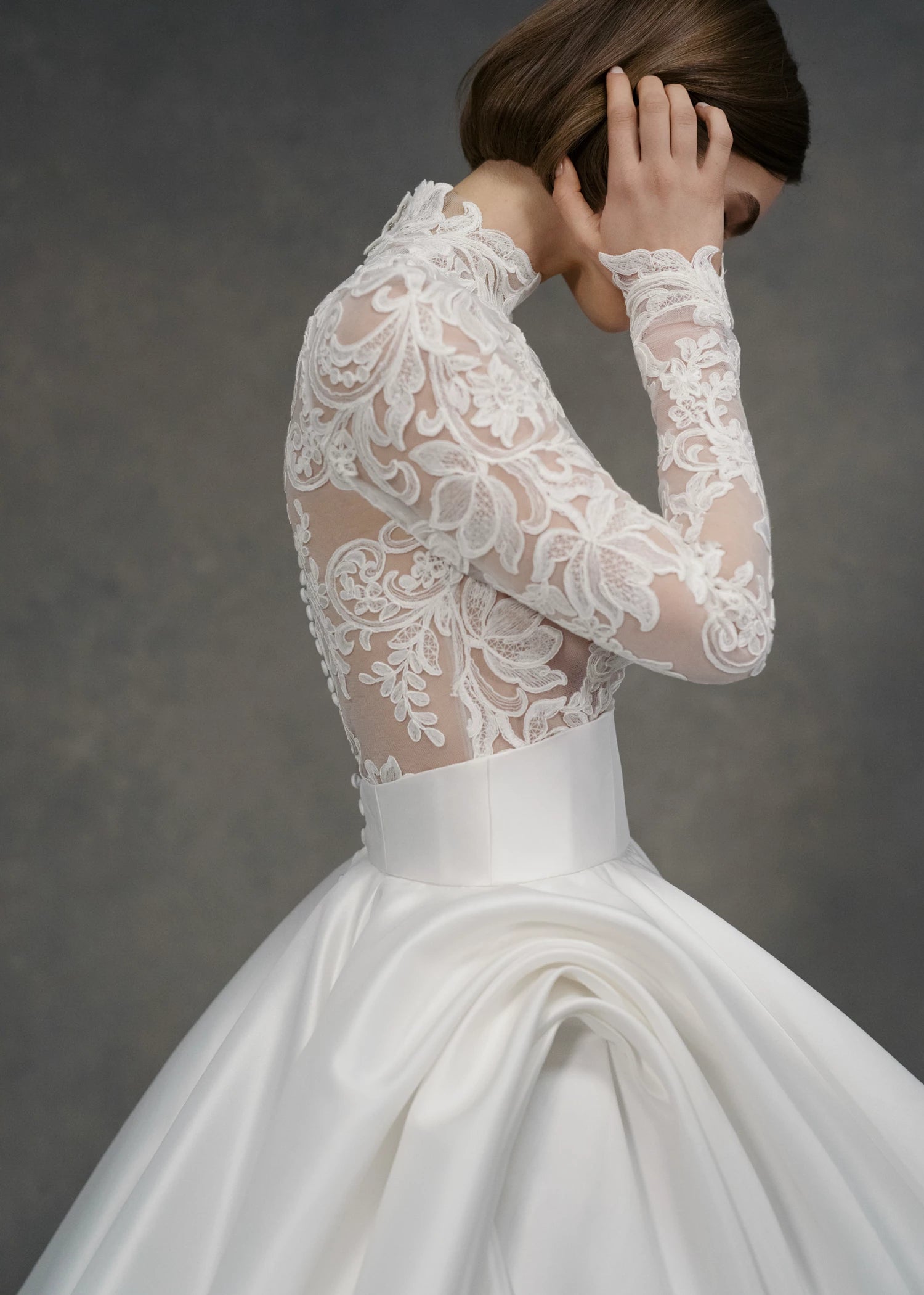 The Gigi Topper by Anne Barge is an Illusion tulle long sleeve mockneck top appliquéd with French Alençon lace in Silk White.