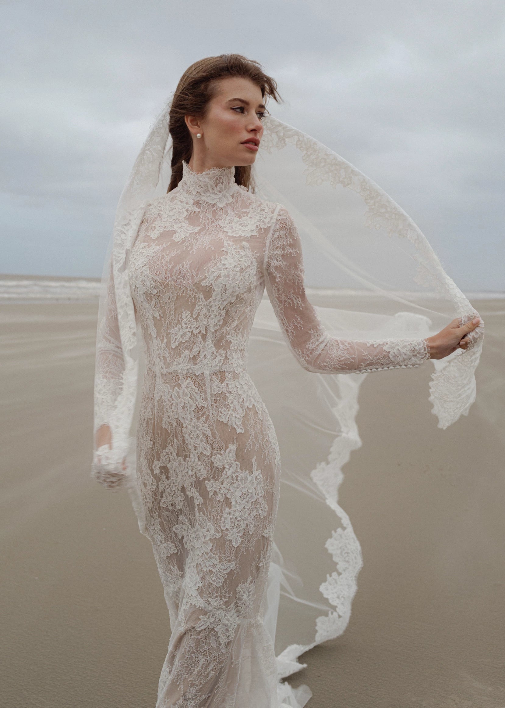 The Blue Willow Leo Veil is a chapel length mantilla veil with Corded lace edge in Silk White.