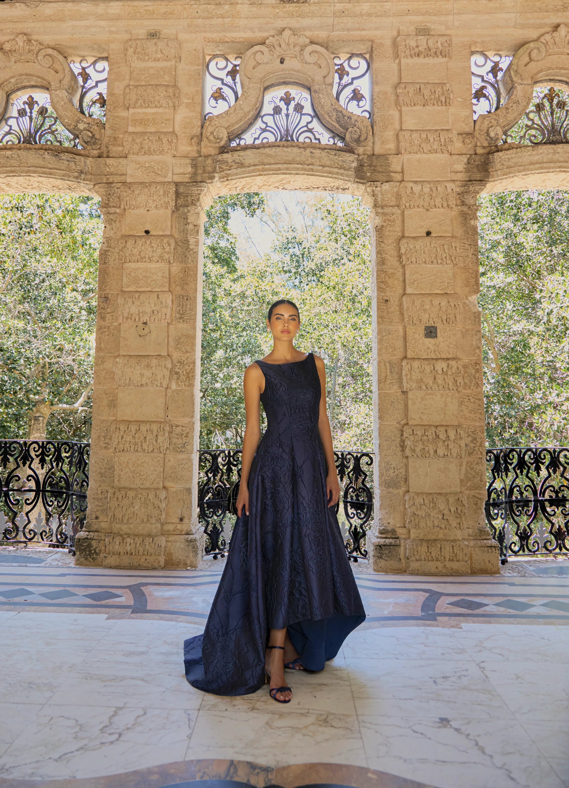 Anne Barge evening gown Marcel, a seam gown of Camellia Vine Jacquard with inverted box pleats and pockets.