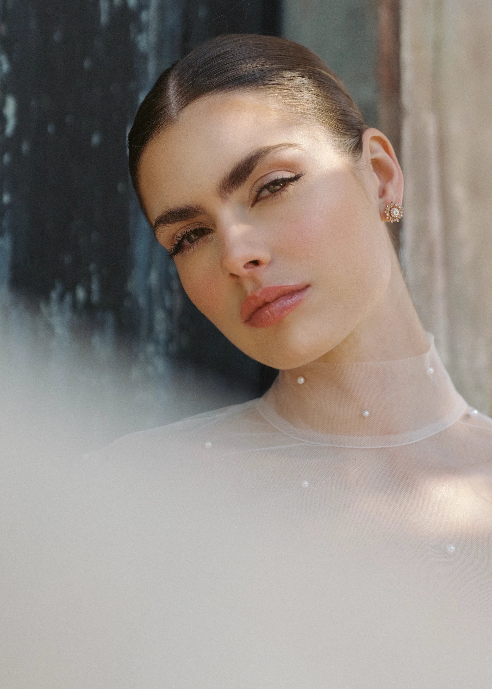 The Blue Willow Troubadour Topper, a pearl dotted illusion topper with mockneck in Silk White.