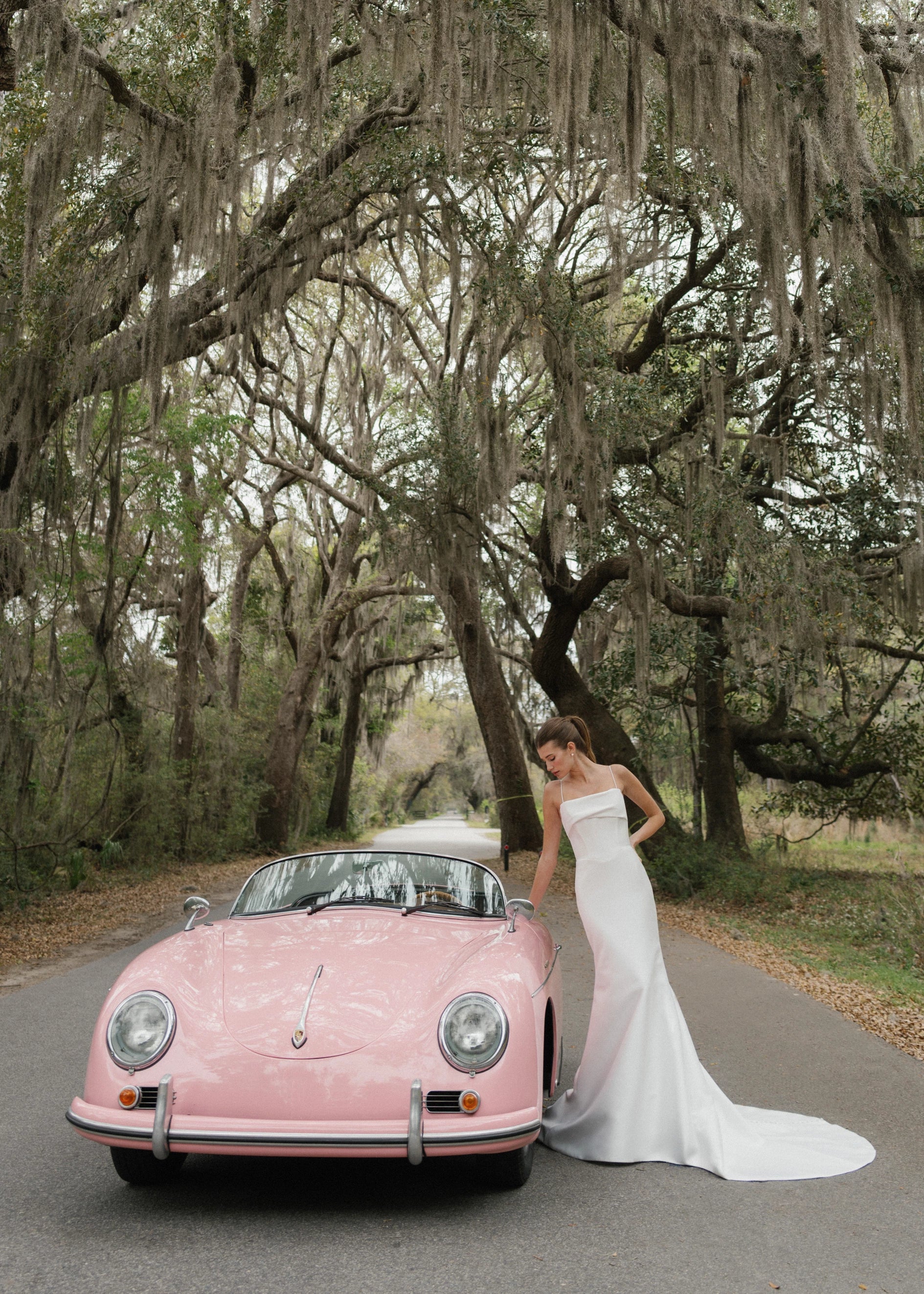 The Radcliffe gown is a spaghetti strap fit and flare gown of Soft Mikado with sculpted bodice, asymmetric bodice draping and buttons to the hem.