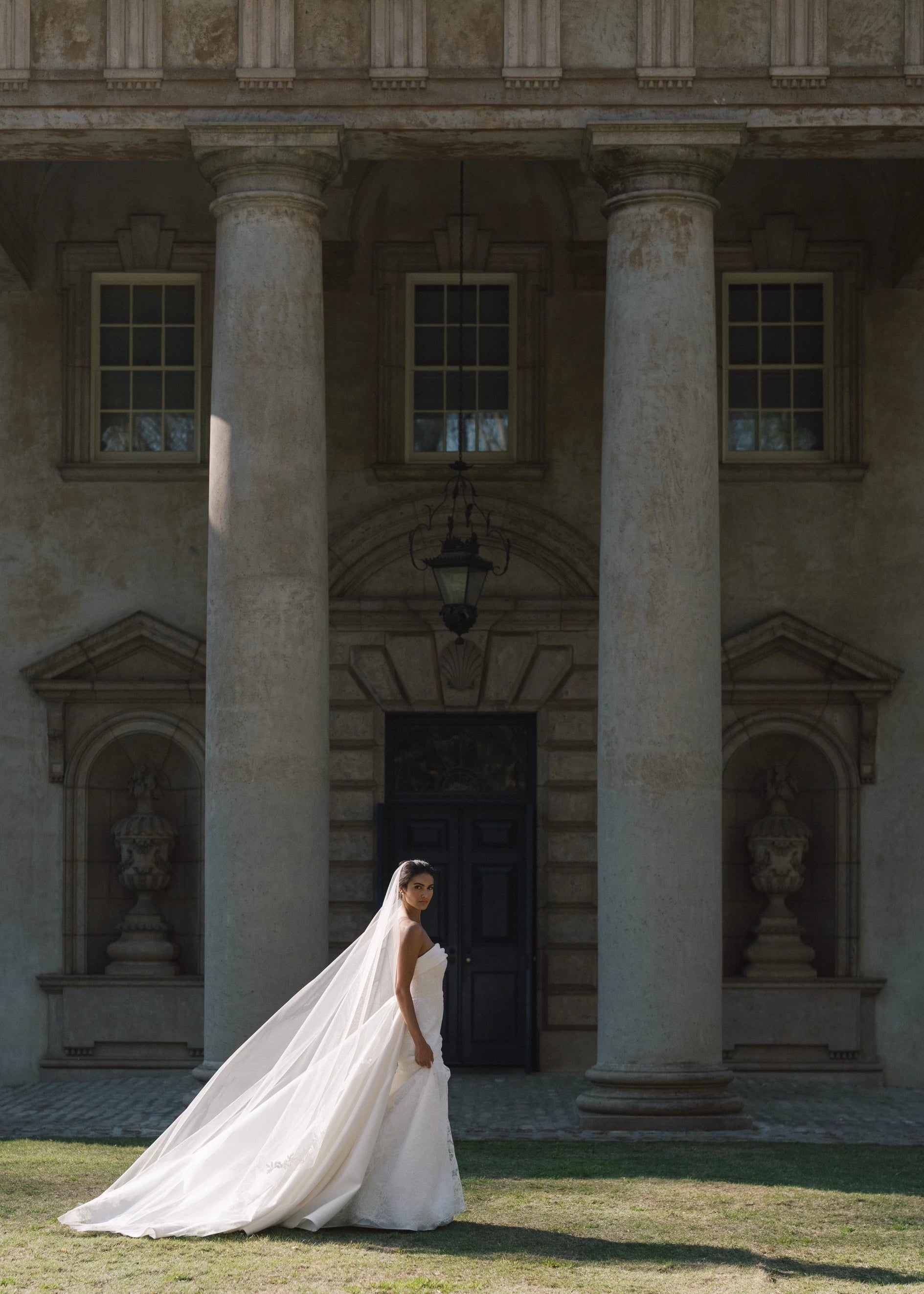 The Rhodes Train by Anne Barge is a box pleated detachable train of Kalika in Silk White.