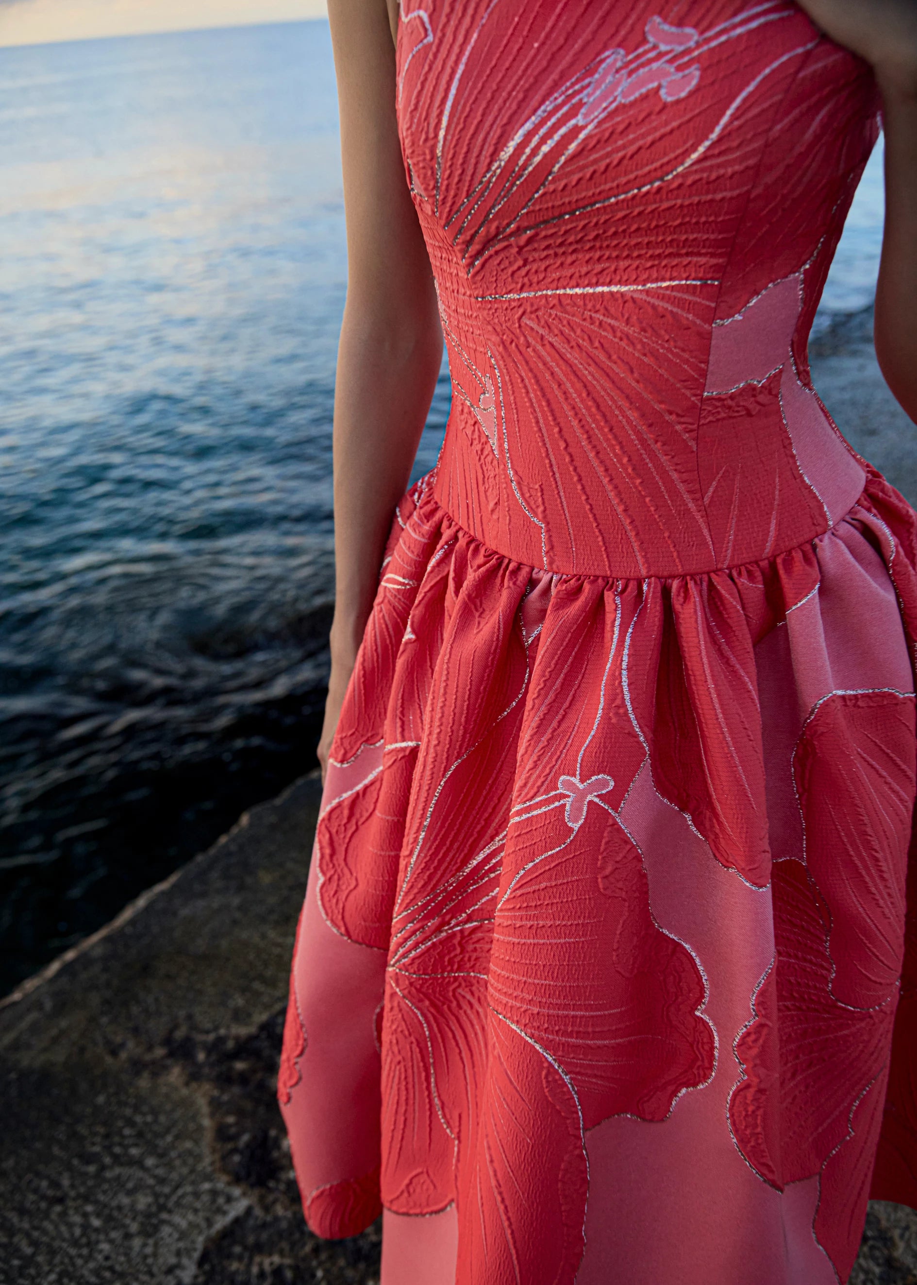 Anne Barge evening gown Rocio, a bateau neck tea-length dress of Petal Canopy Jacquard with drop waist and full, softly gathered skirt.