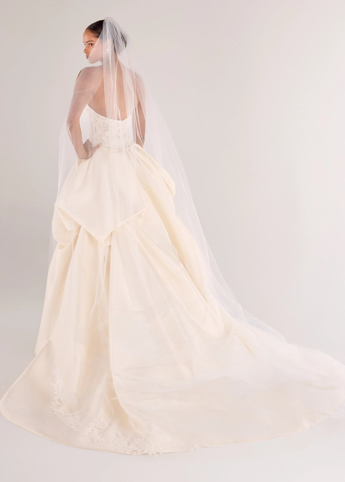 The Wentworth Veil by Anne Barge is a royal veil scattered with French Alençon and Chantilly laces