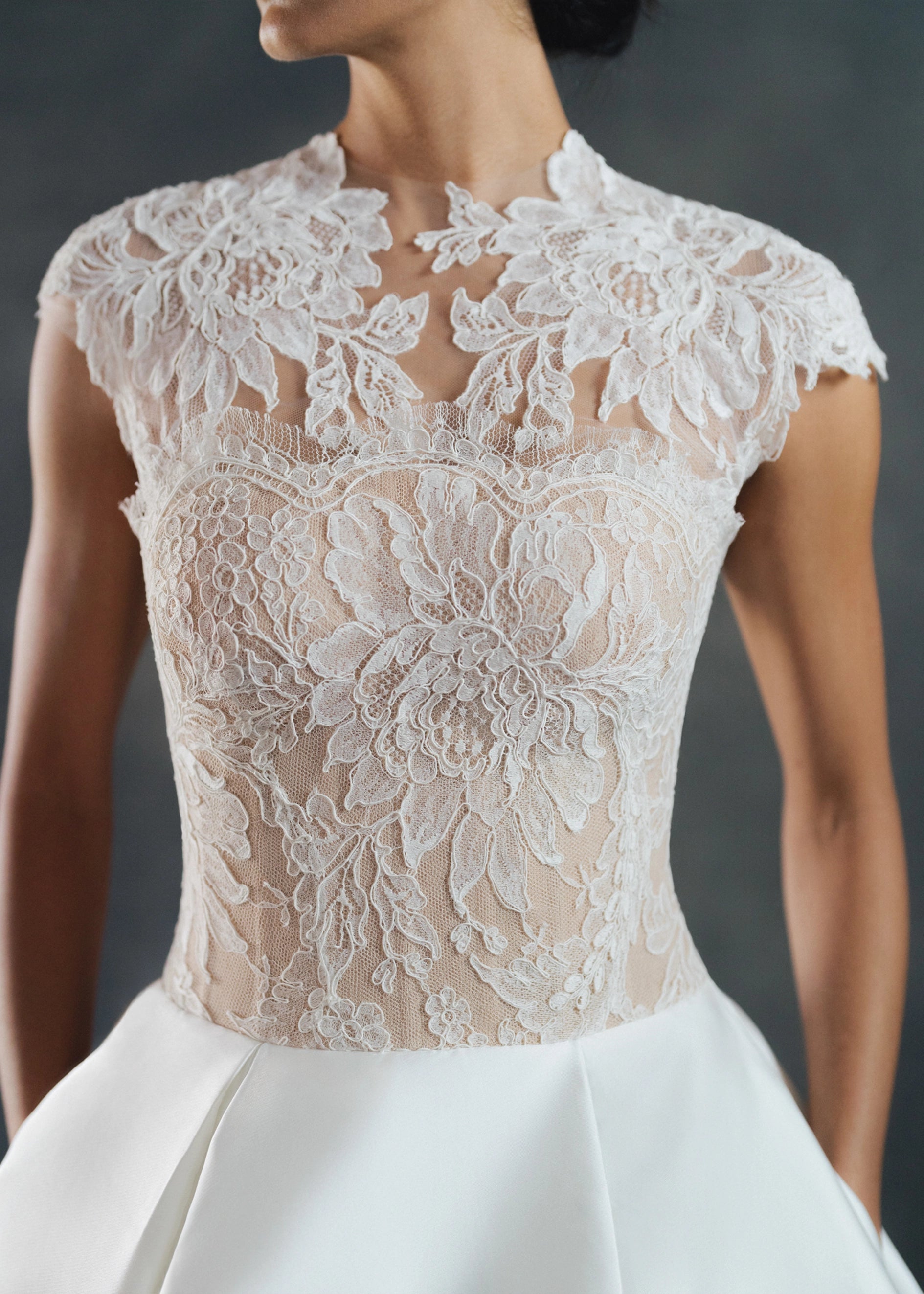 The Wessex Topper by Anne Barge in an illusion tulle cap sleeve topper with Alencon lace appliques in Silk White.