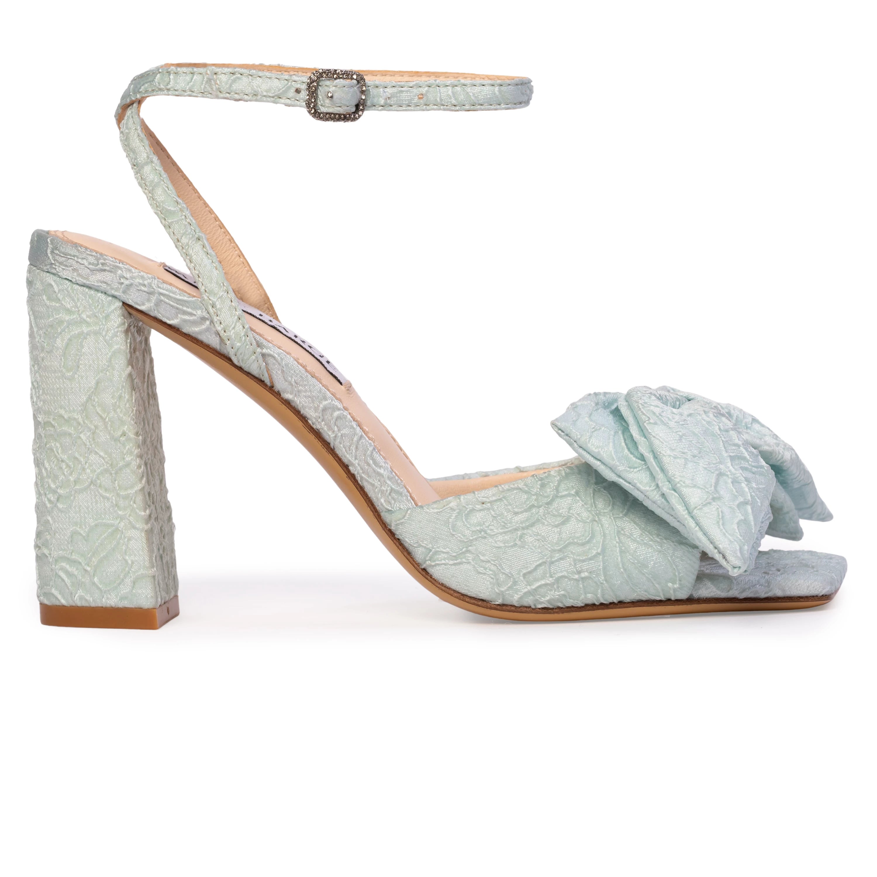 crystal-embellished square buckle and a softly draped bow detail across the upper. Crafted from luxurious satin jacquard.