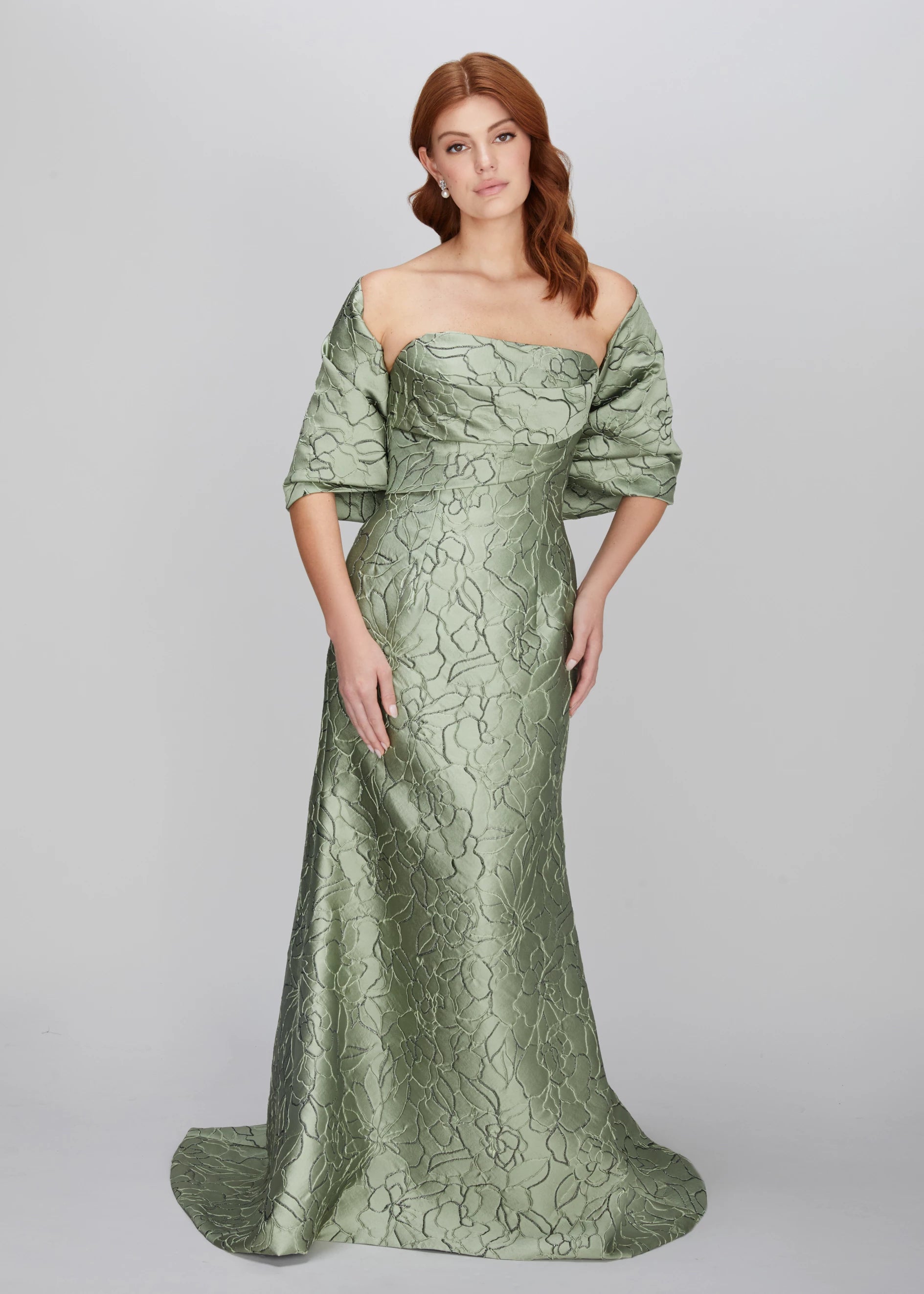 The Bryn Wrap from Black Label by Anne Barge is an elastic wrap in Jacquard Floral Lamé meant to be worn over or off-the-shoulder