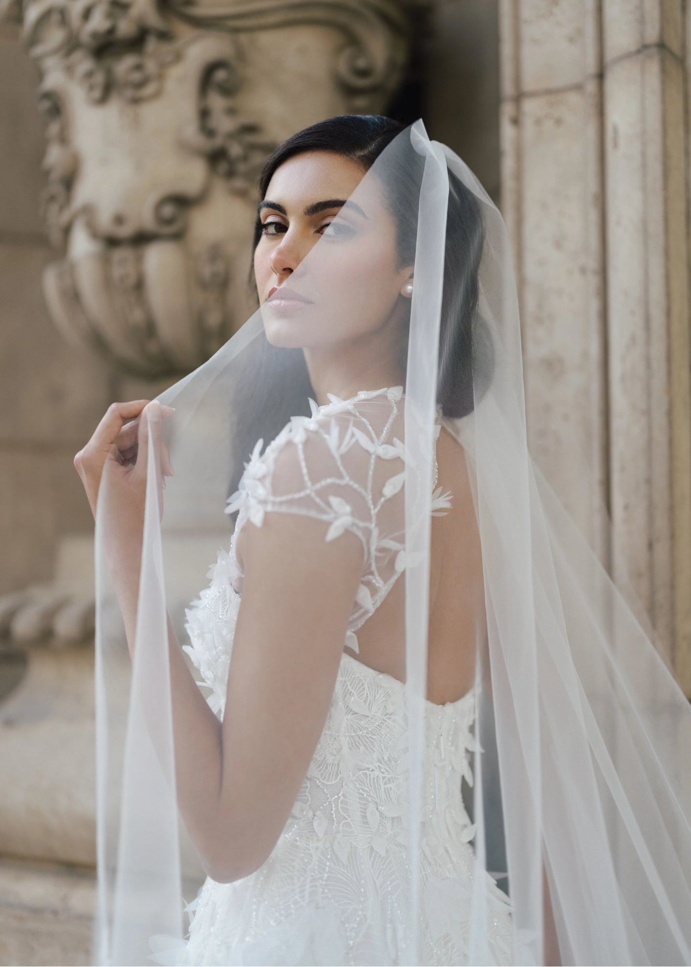 The Woodruff Shawl by Anne Barge is a keyhole style shawl of Illusion tulle with 3D Feathery Petal Embroidery.