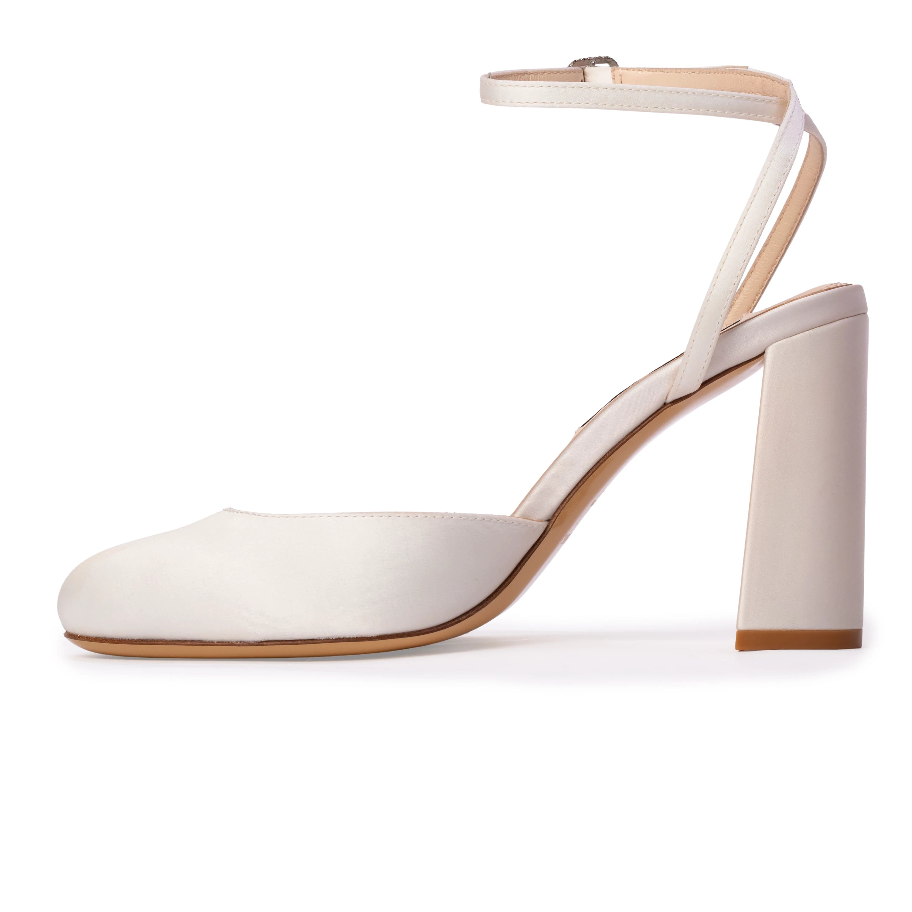 This Anne Barge round-toe pump is crafted from smooth satin and set on a classic 90 mm block heel. Finished with a radiant crystal-embellished buckle.