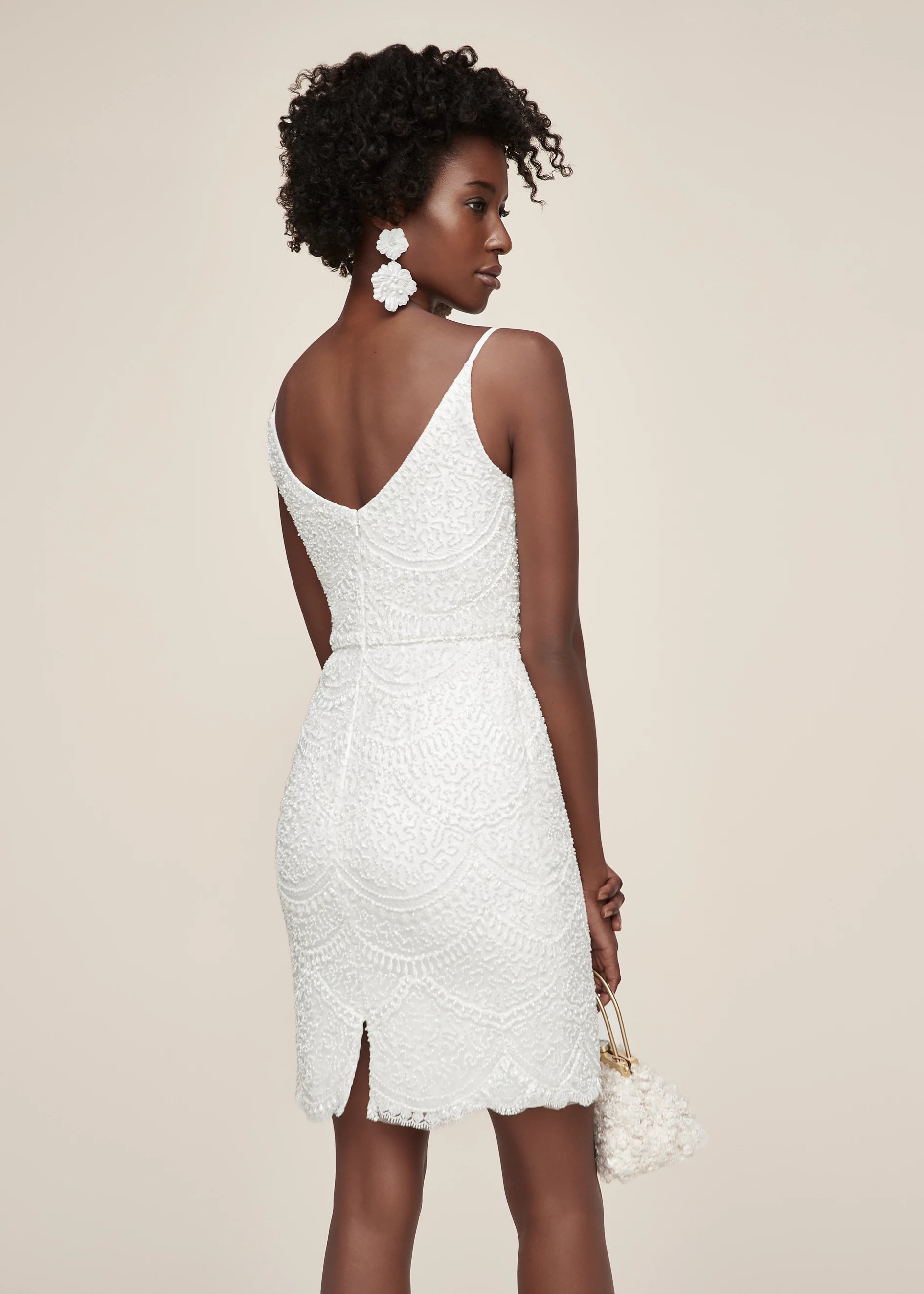 Anne Barge “Dream With Me” little white dress - Classic and chic, this little white dress features beaded lace fabric, a V-neck bodice and beaded detailing along the waist in Silk White.
