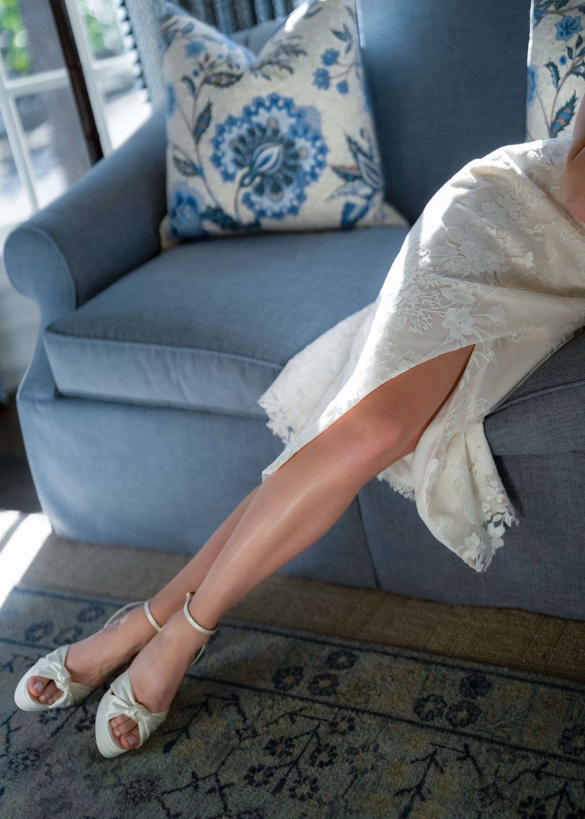 Anne Barge “Unforgettable” little white dress — halter midi dress with flattering draping and slit, comprised of intricate embroidery and a split open back detail in Silk White/Nude.