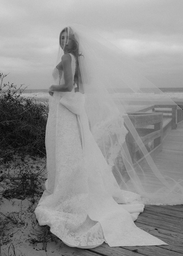 The Blue Willow Ashley Veil is a cathedral veil with a Scrollwork Embroidery edge in Pearl.