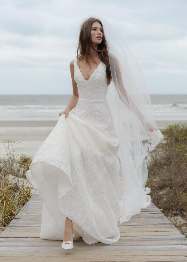 The Blue Willow Ashley Veil is a cathedral veil with a Scrollwork Embroidery edge in Pearl.