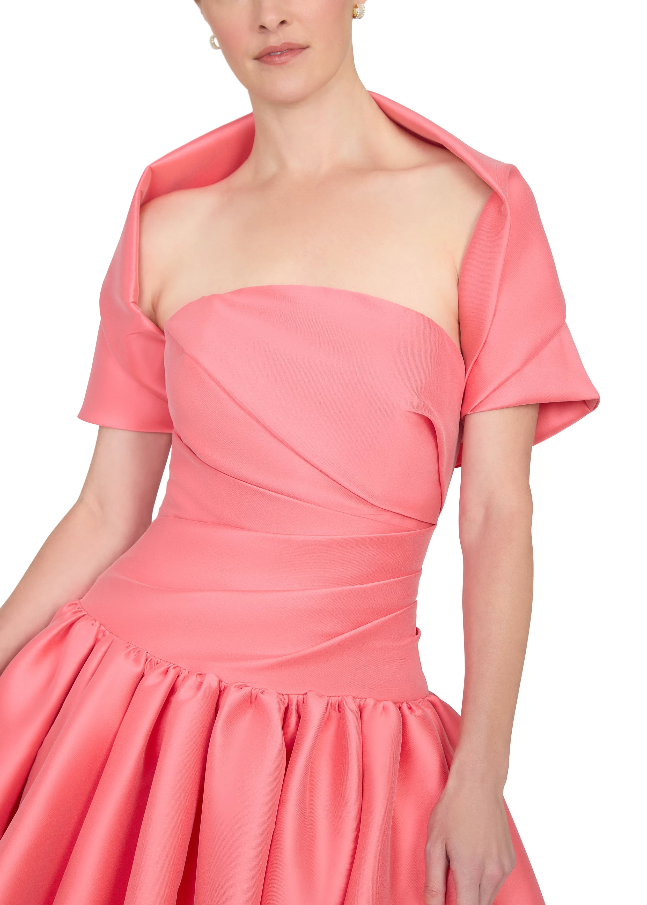 Anne Barge evening gown Consuelo, an arched strapless drop waist bodice with asymmetrical draping and high-low bubble hem gathered skirt.