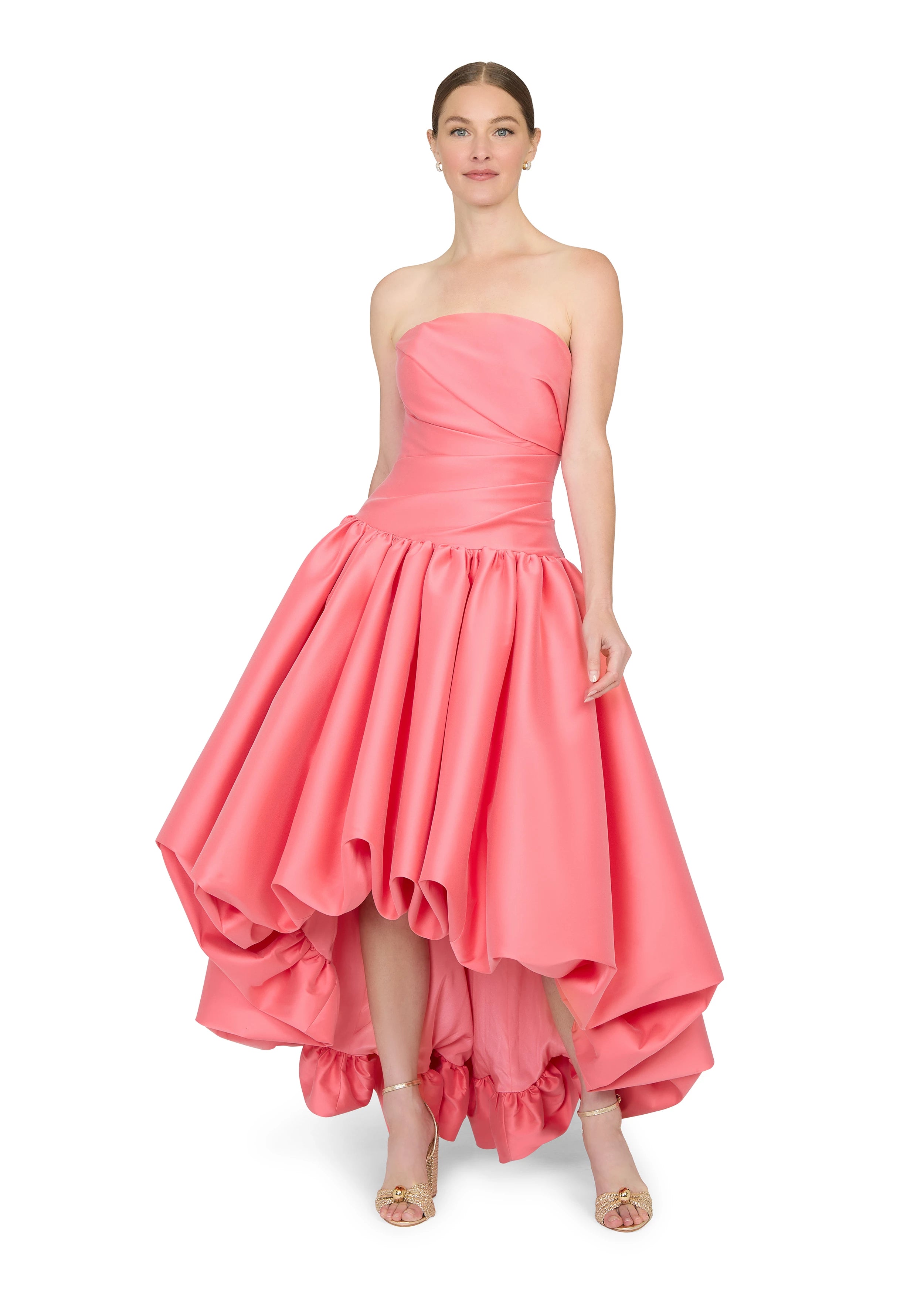 Anne Barge evening gown Consuelo, an arched strapless drop waist bodice with asymmetrical draping and high-low bubble hem gathered skirt.