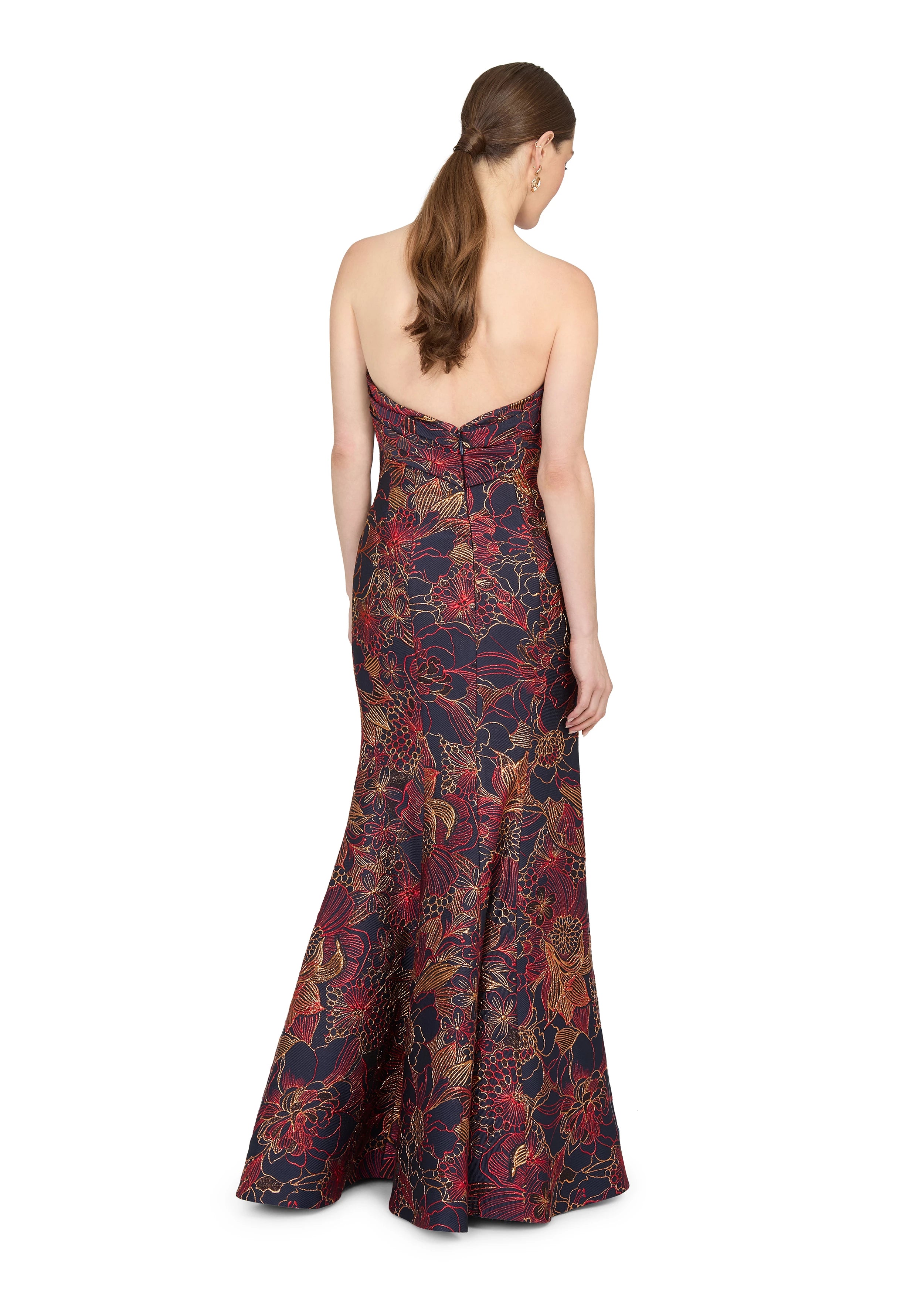 Anne Barge evening gown Esperanza, is a pointed sweetheart strapless fit and flare gown of Opulent Filigree Jacquard, accentuated by a twisted draped bodice. 