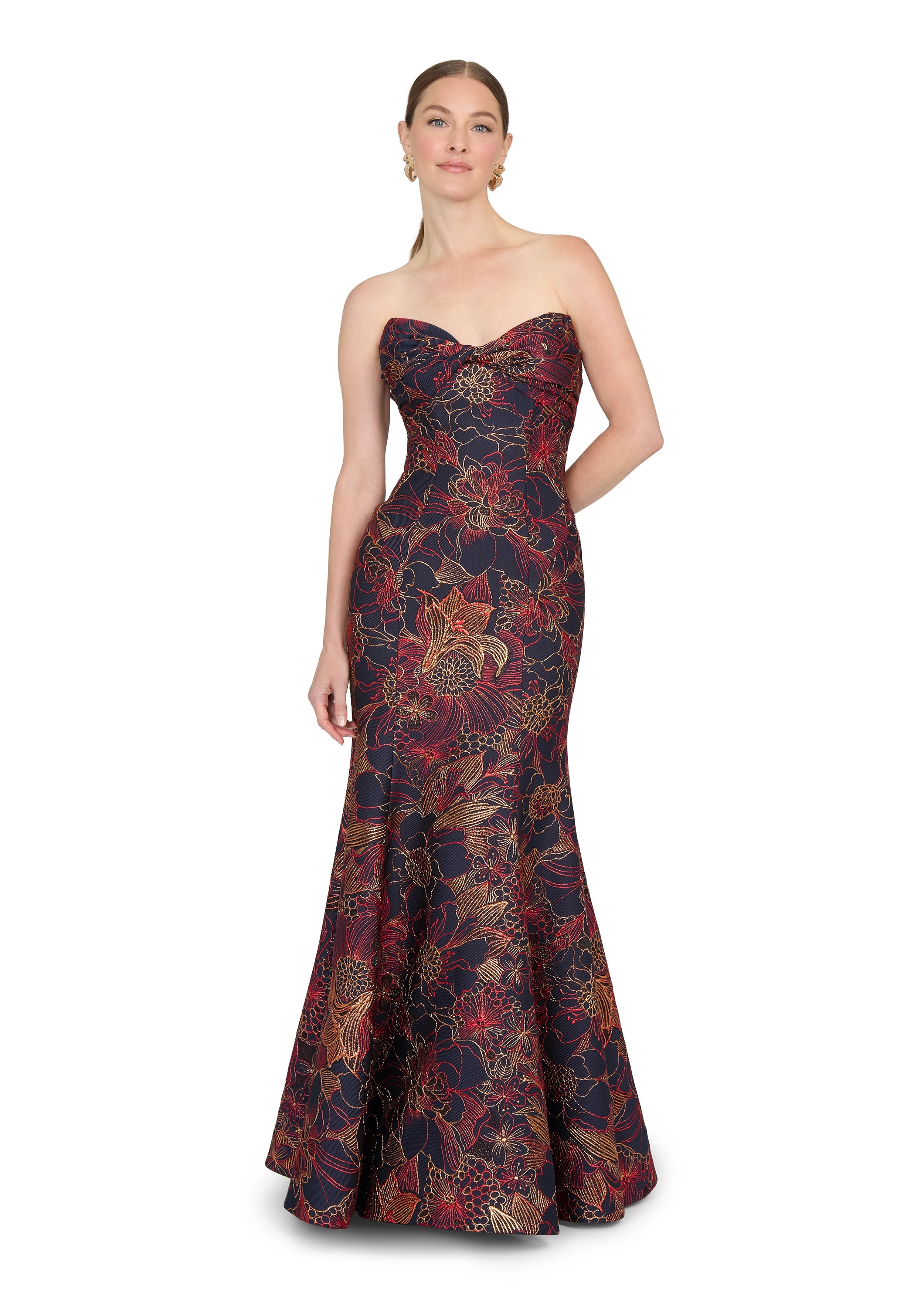 Anne Barge evening gown Esperanza, is a pointed sweetheart strapless fit and flare gown of Opulent Filigree Jacquard, accentuated by a twisted draped bodice.