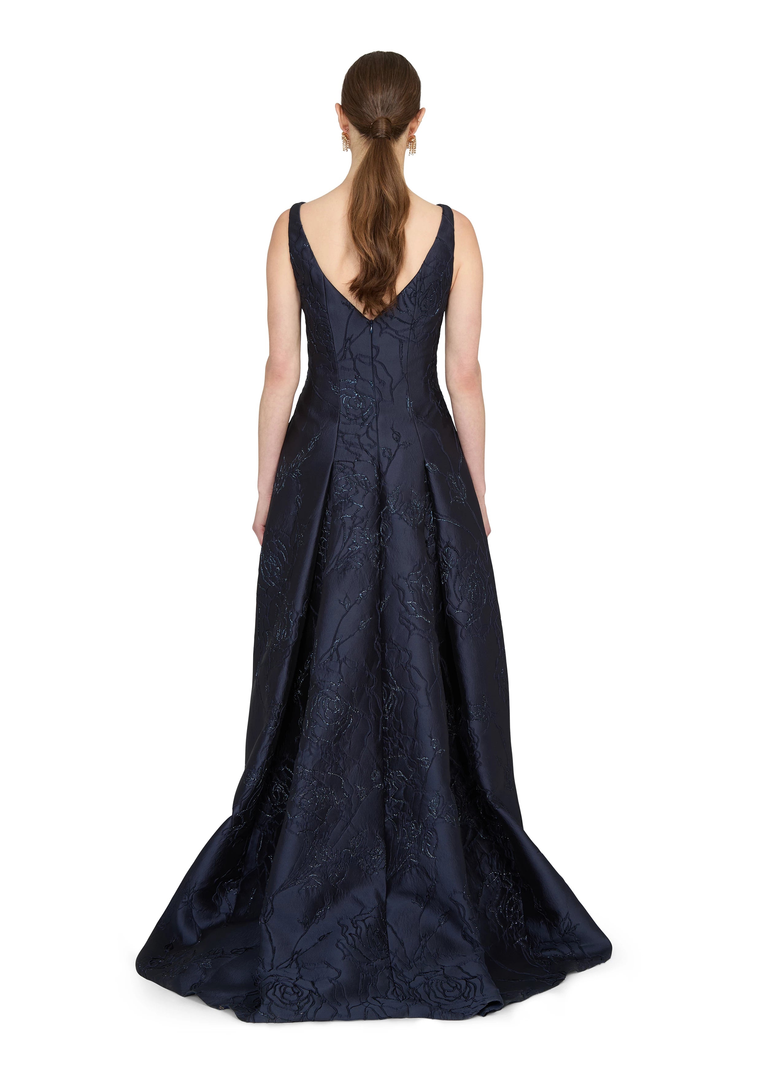 Anne Barge evening gown Letizia, is an arched strapless drop waist ballgown of Camellia Vine Jacquard with neckline draping and pleated skirt.