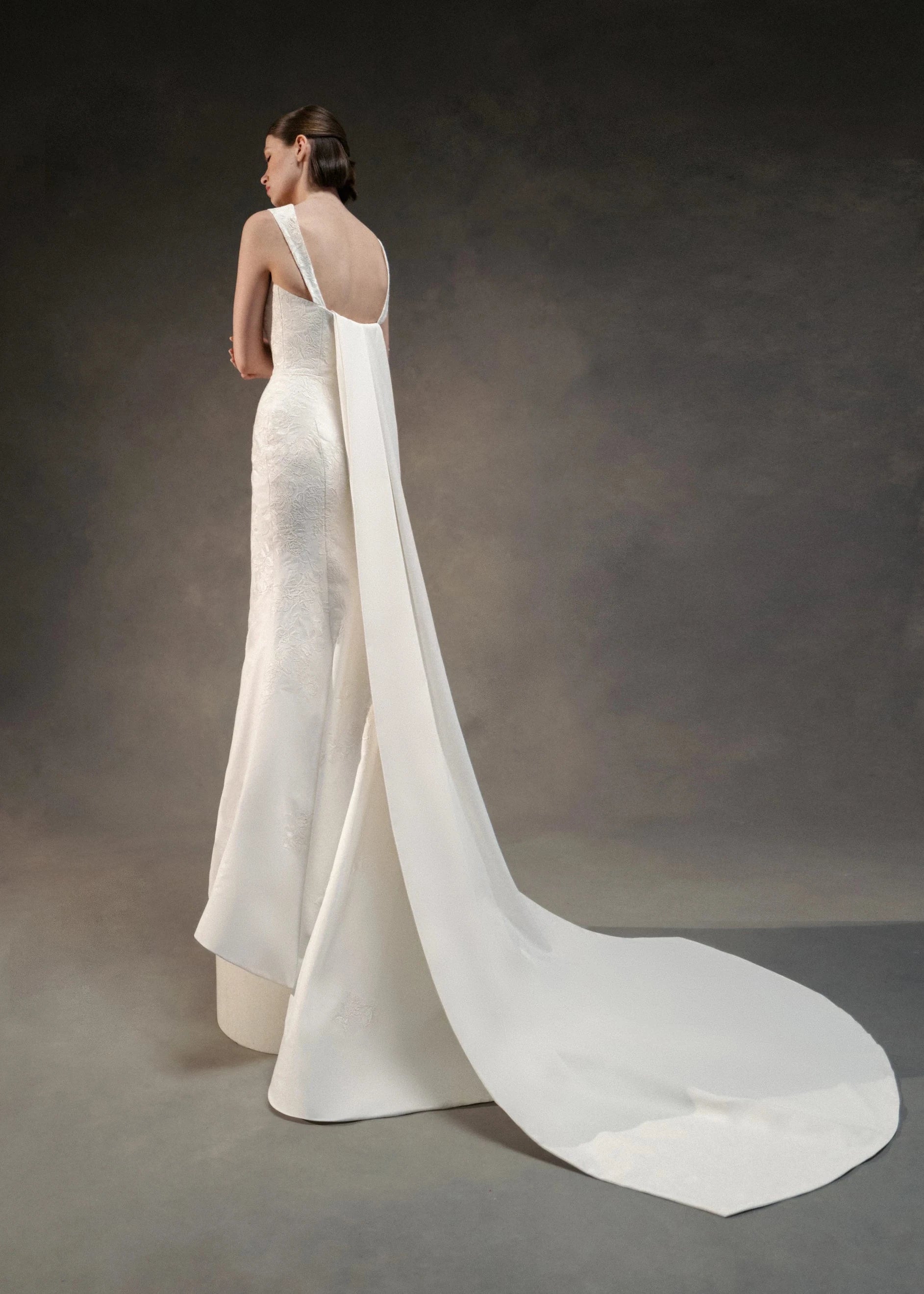 The Blue Willow Raye Train is a box pleated detachable watteau train of Matte Satin in Silk White.