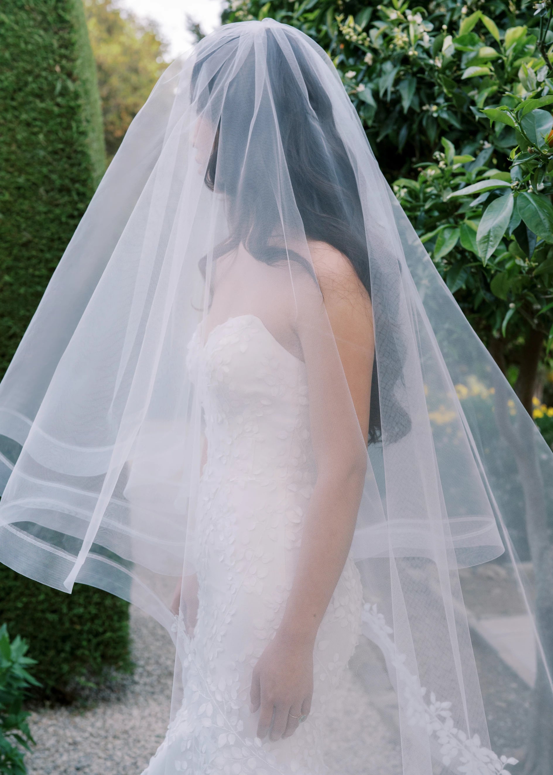 A strapless sweetheart mermaid gown with 3D leaf embroidery