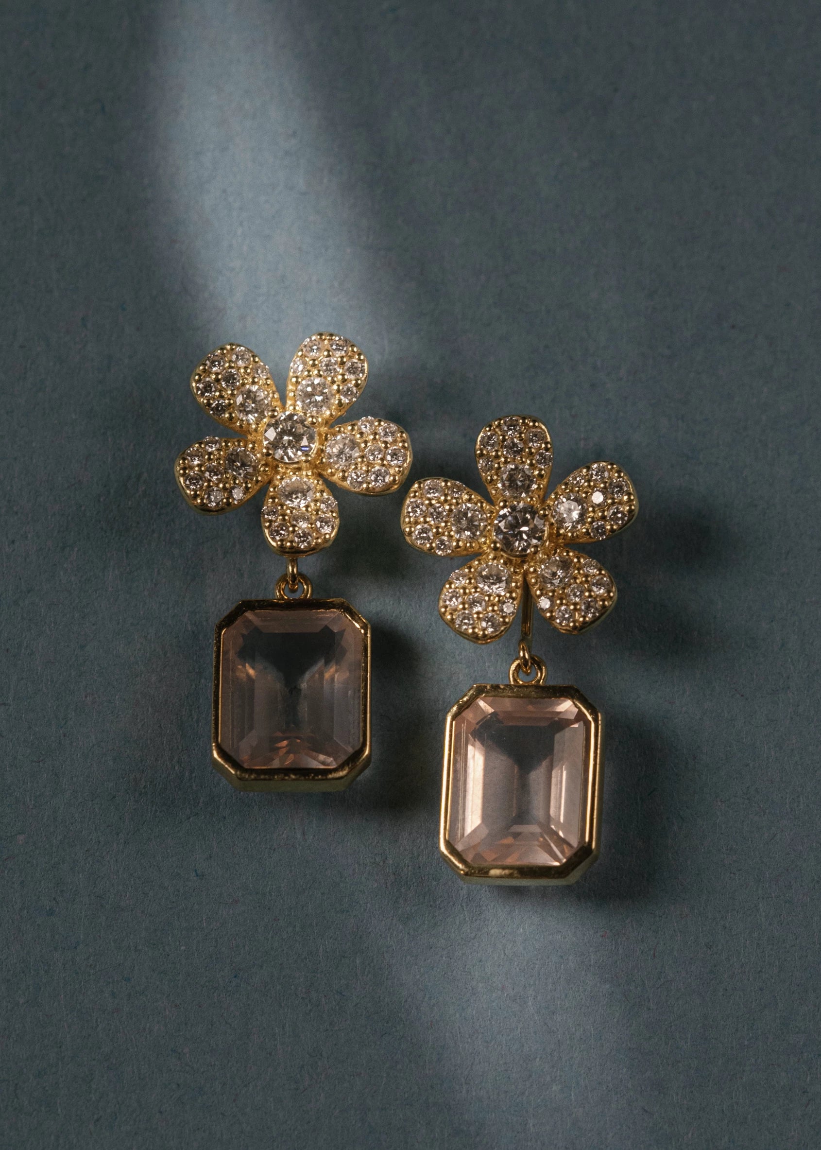 Designed by Atlanta jewelry designer Laura Pearce, these amethyst earring jackets are designed to slip onto the back of any earring, transforming a simple pair.