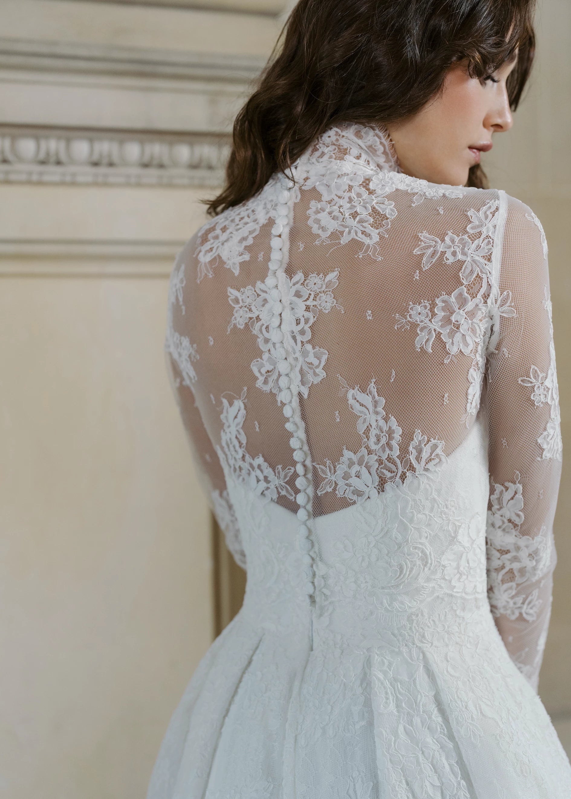The Blue Willow Collier Mockneck Topper is a long sleeve mockneck top of Corded Lace in Silk White. 