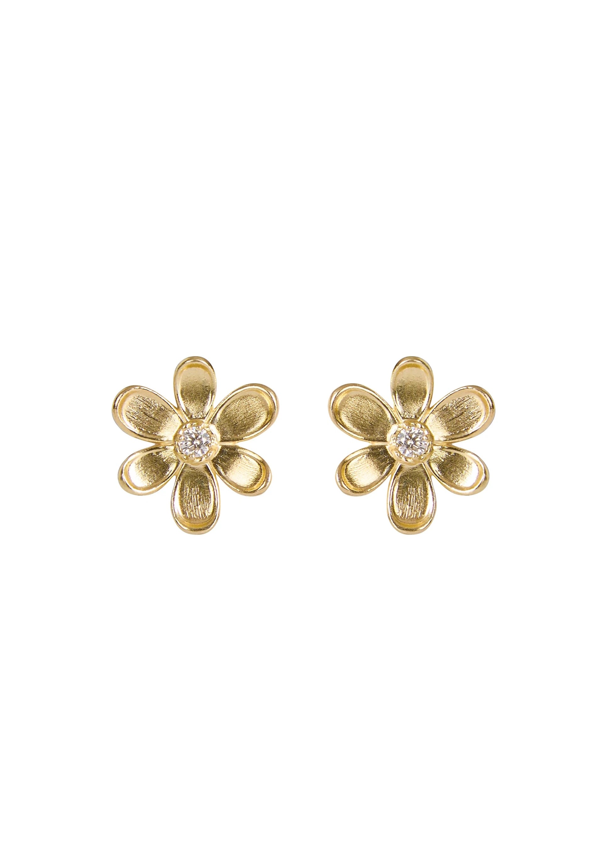 Designed by Atlanta jewelry designer Laura Pearce, delicate Daisy flower studs, featuring a 0.20 CTTW brilliant diamond.