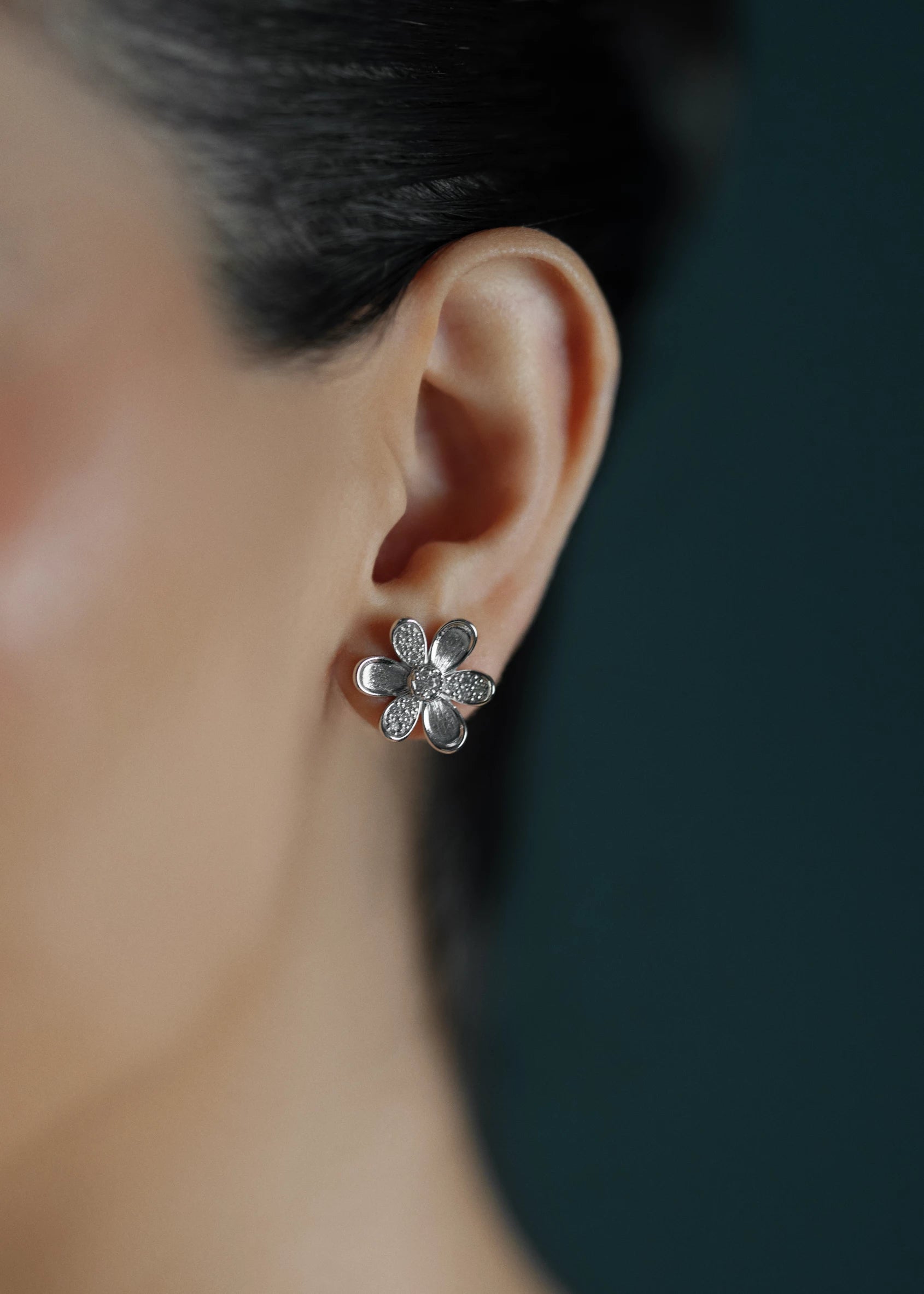 Designed by Atlanta jewelry designer Laura Pearce, delicate Daisy pave diamond flower studs, featuring 0.38 CTTW in brilliant diamonds, and available in 18K Yellow or White Gold.