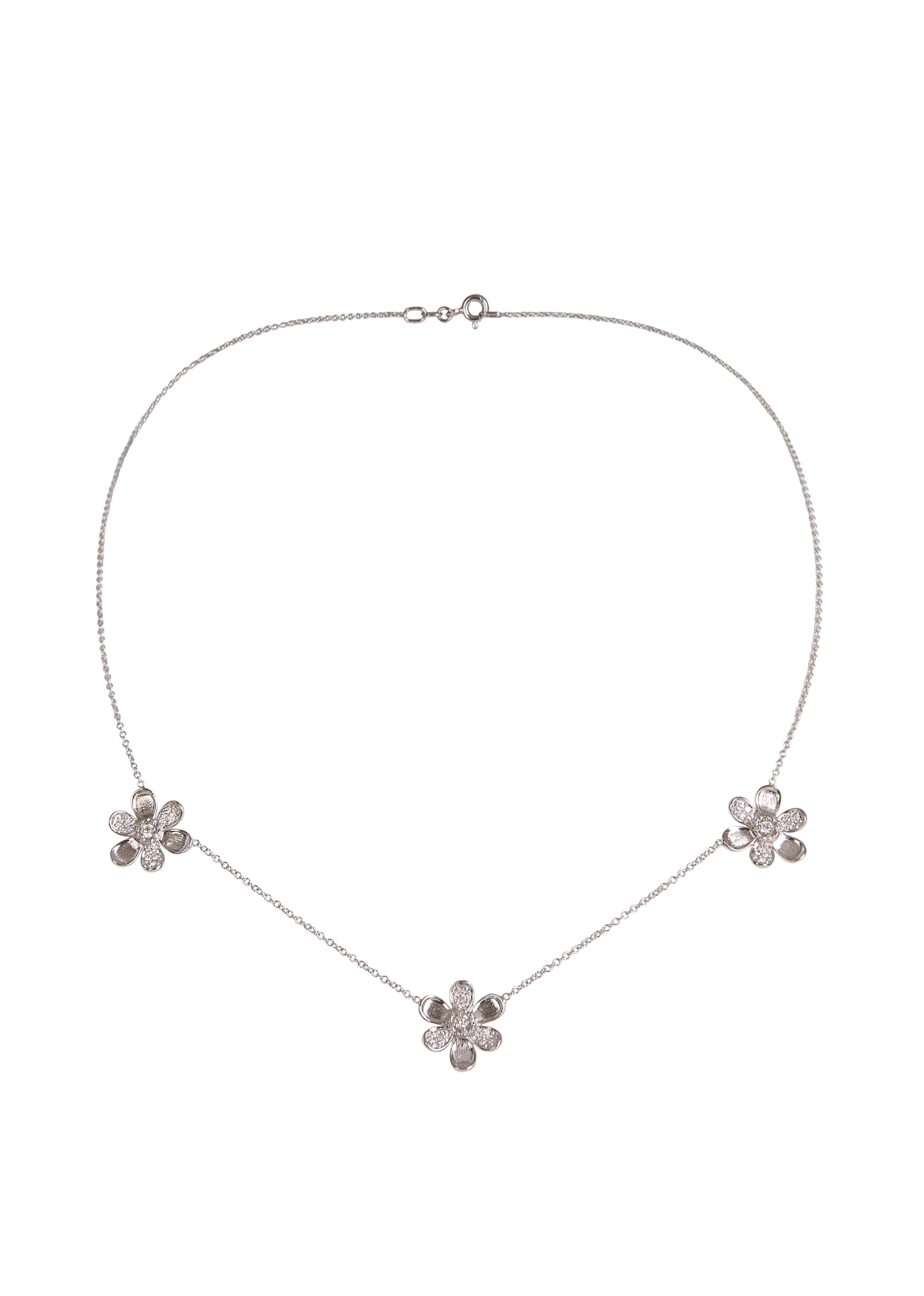 Designed by Atlanta jewelry designer Laura Pearce, three delicate pavé diamond flowers on a 16" strand, featuring 0.27 CTTW of brilliant diamonds.