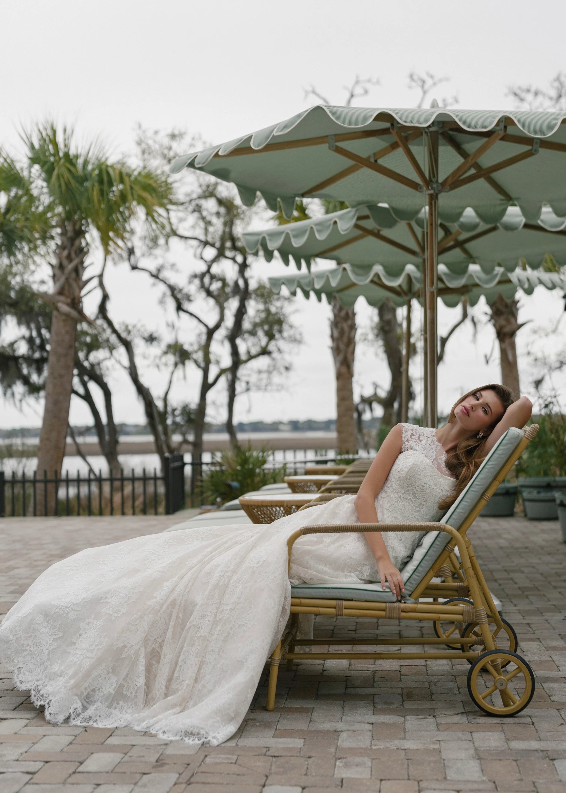 The Dunlin gown is a strapless contoured neckline collapsed A-line of Blossom Corded Lace with Chantilly and soft Gazar underlay.