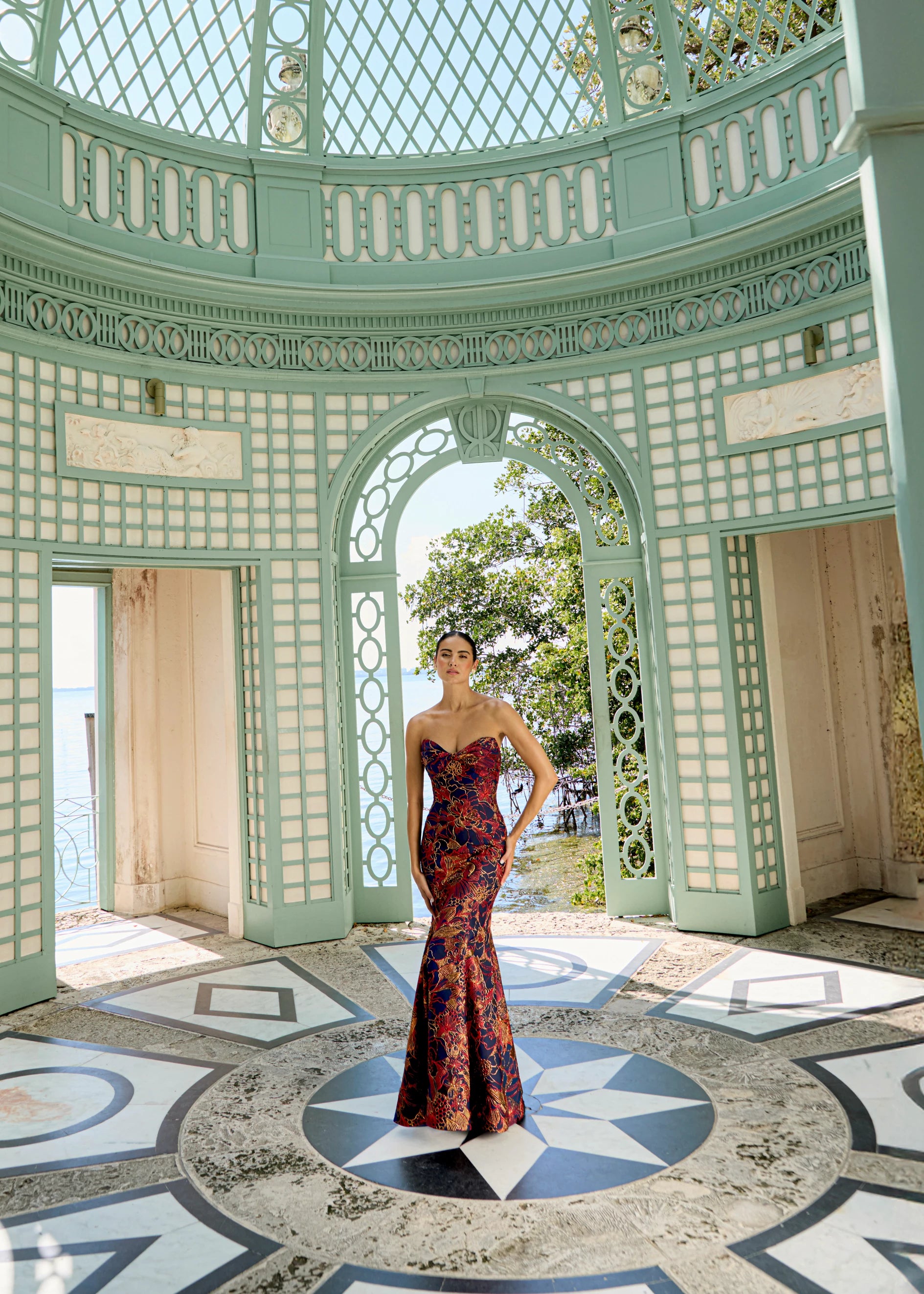 Anne Barge evening gown Esperanza, is a pointed sweetheart strapless fit and flare gown of Opulent Filigree Jacquard, accentuated by a twisted draped bodice.