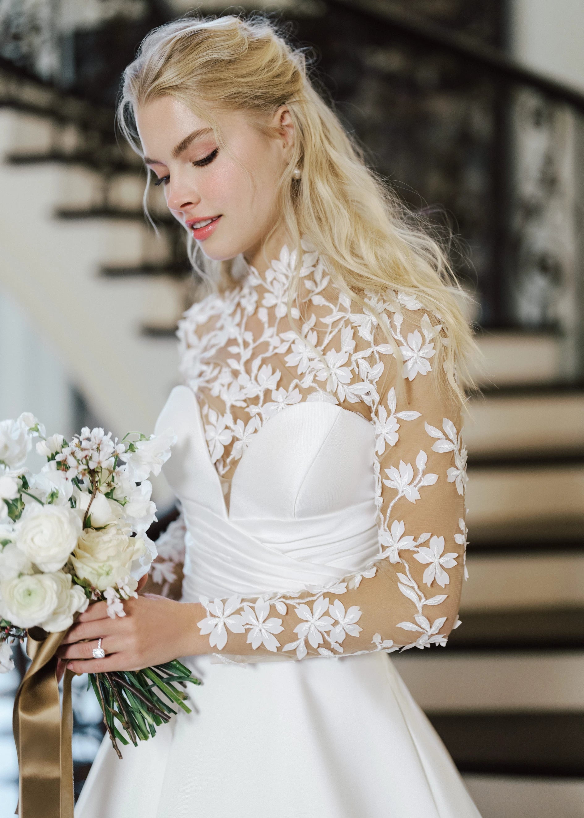 The Blue Willow High Meadows Topper, a mock neck long sleeve top with 3D leaf embroidery.