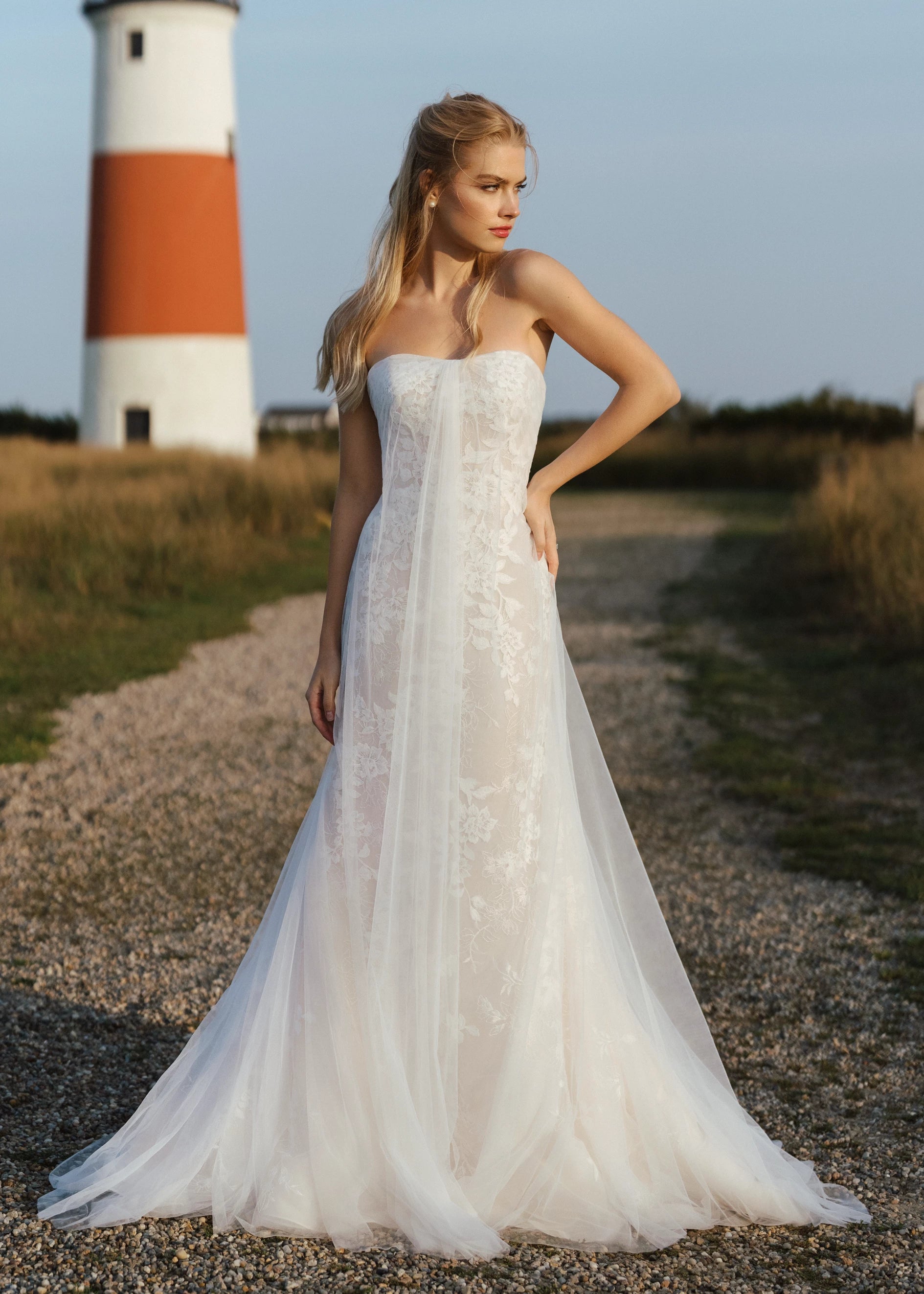The Isobel Watteau Train by Anne Barge is an Illusion tulle detachable train with Threaded Floral embroidery at hem in Silk White.