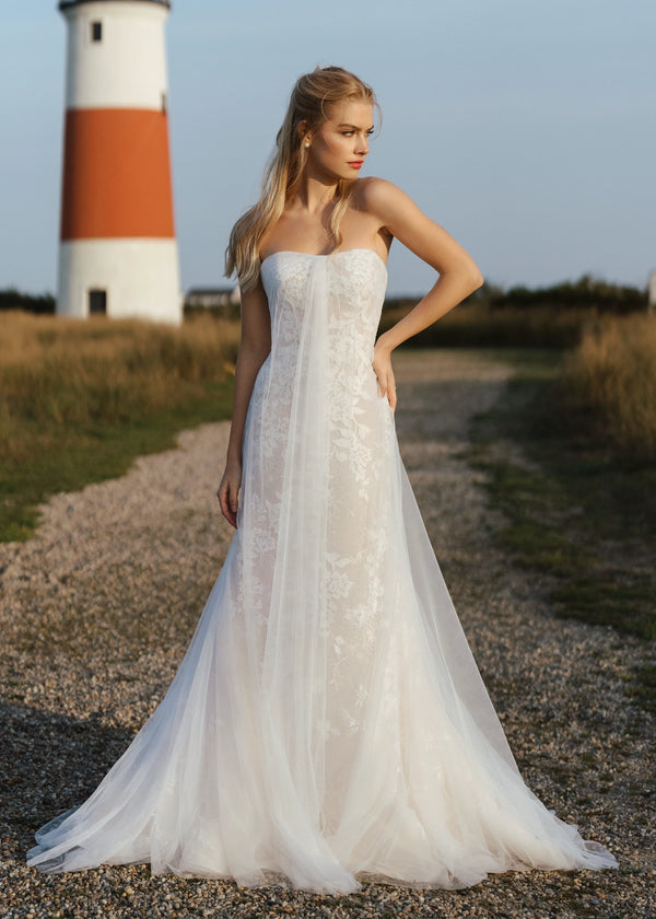 The Isobel Watteau Train by Anne Barge is an Illusion tulle detachable train with Threaded Floral embroidery at hem in Silk White.