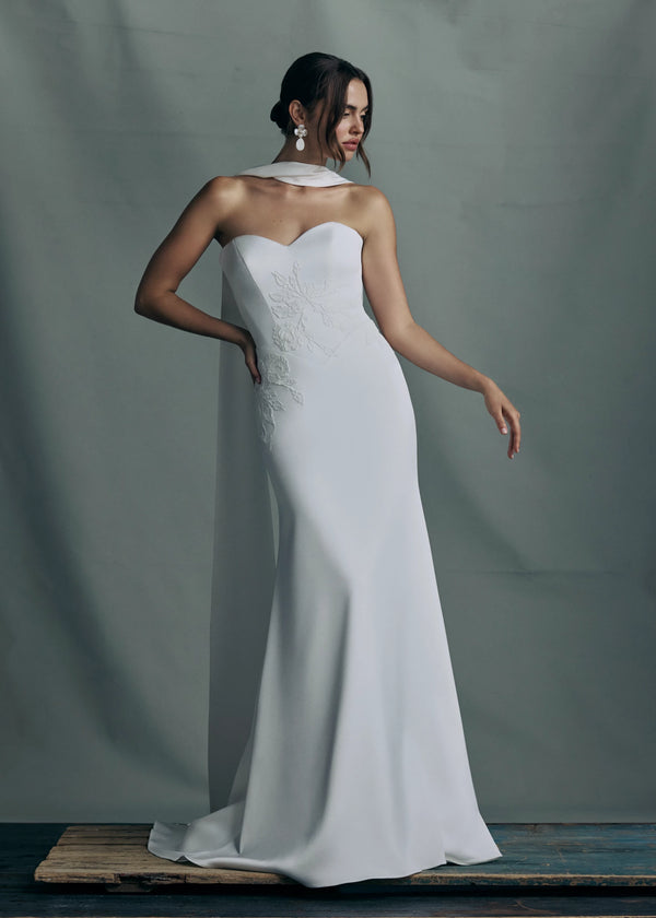 The Luminaire gown by Anne Barge paired with the Luminaire Neck scarf of Crepe Back Satin with Vine Embroidered Lace appliques at the edges.