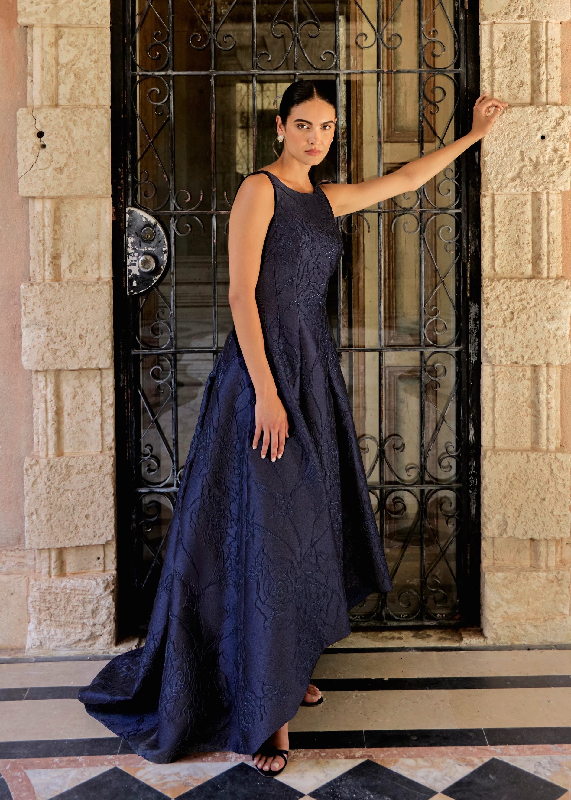 Anne Barge evening gown Marcel, a seam gown of Camellia Vine Jacquard with inverted box pleats and pockets.