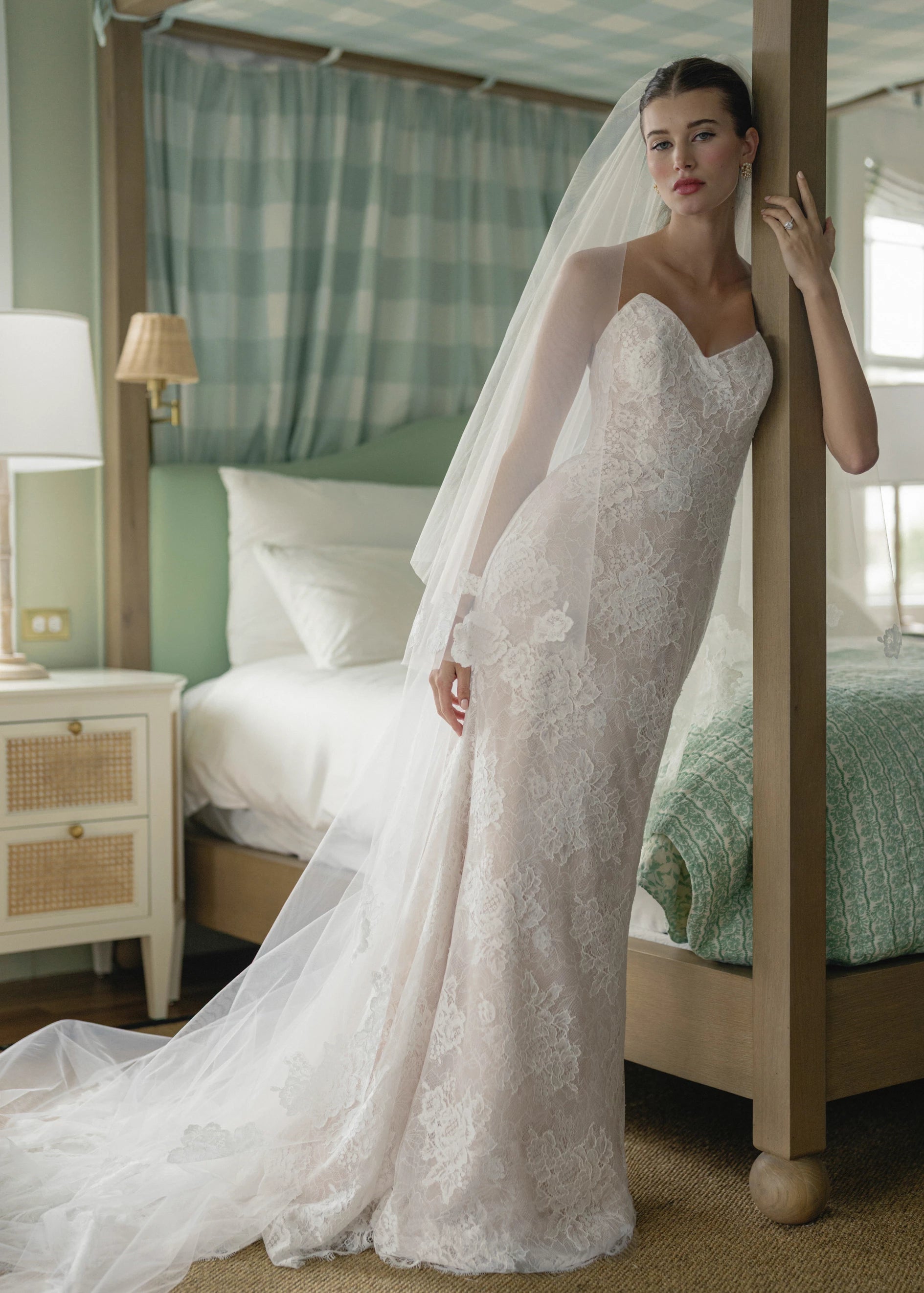 The Pawley gown is a pointed strapless straight gown of Blossom Corded Lace with Chantilly underlay.