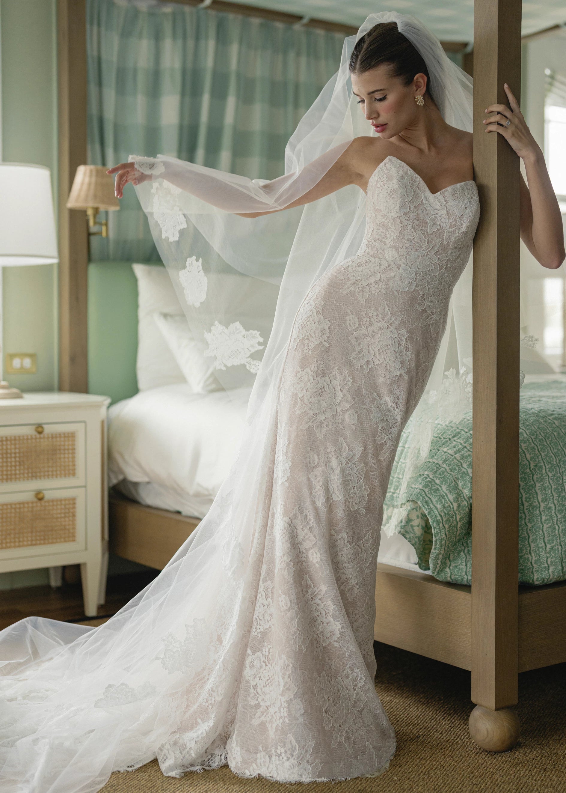 The Pawley gown is a pointed strapless straight gown of Blossom Corded Lace with Chantilly underlay.