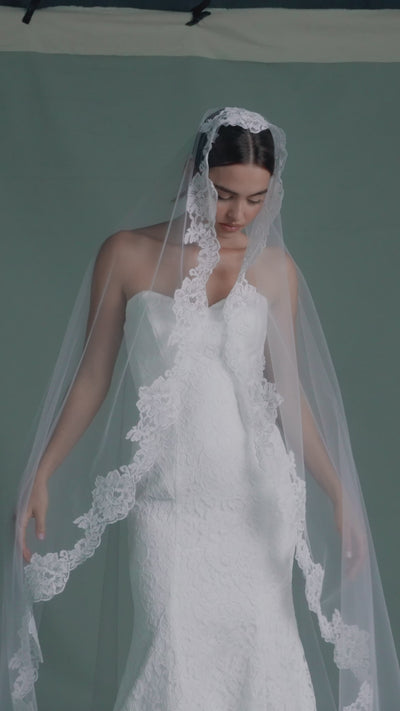 The Anouk veil is a mantilla veil with Corded Scrolling Floral Lace border in Silk White. 