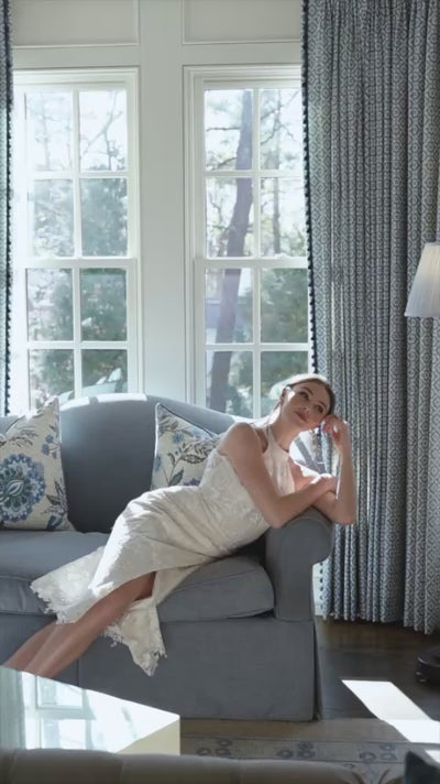 Anne Barge “Unforgettable” little white dress — halter midi dress with flattering draping and slit, comprised of intricate embroidery and a split open back detail in Silk White/Nude.